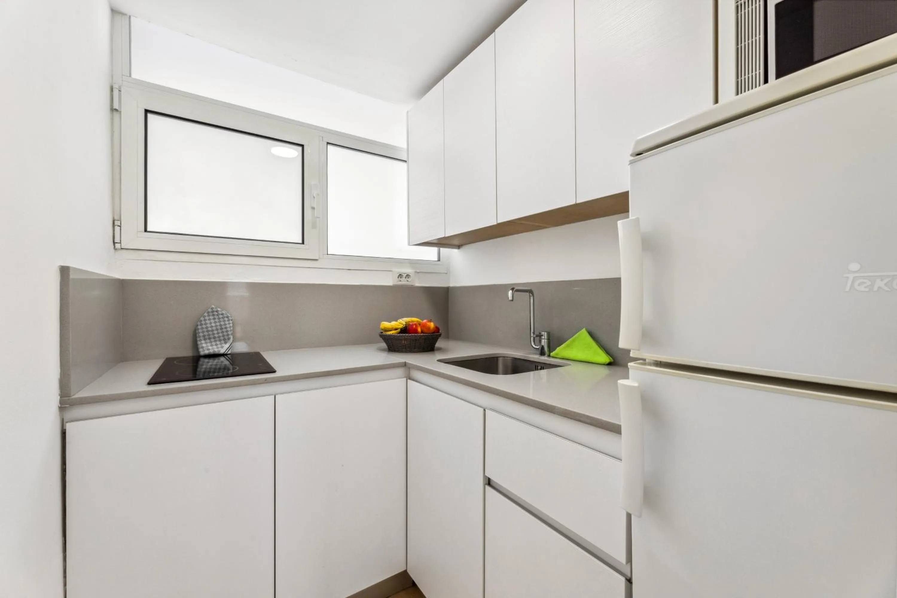 Kitchen or kitchenette in Apartamentos El Capricho