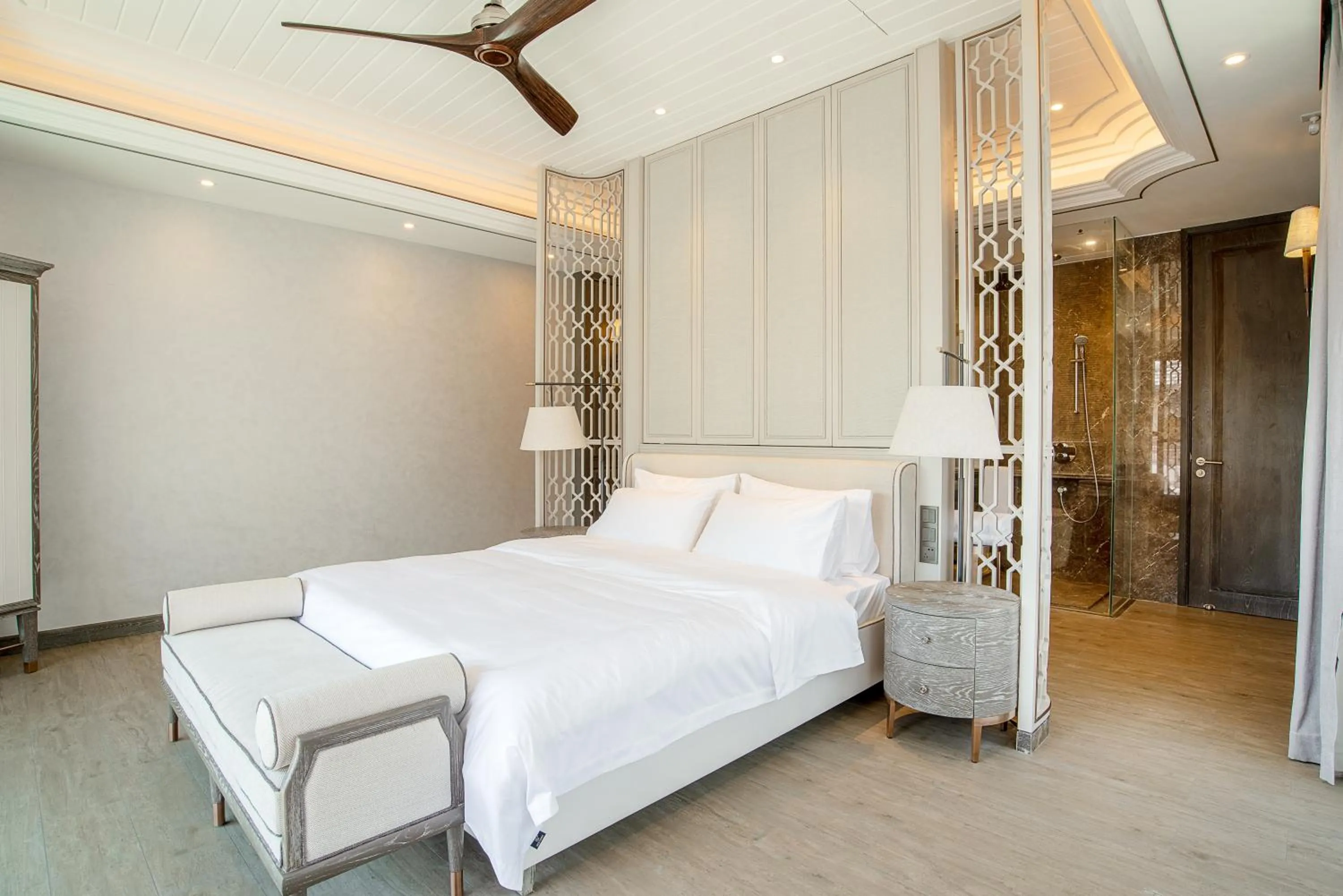 Bed in HaitangBay Loosen Coast Resort Villas