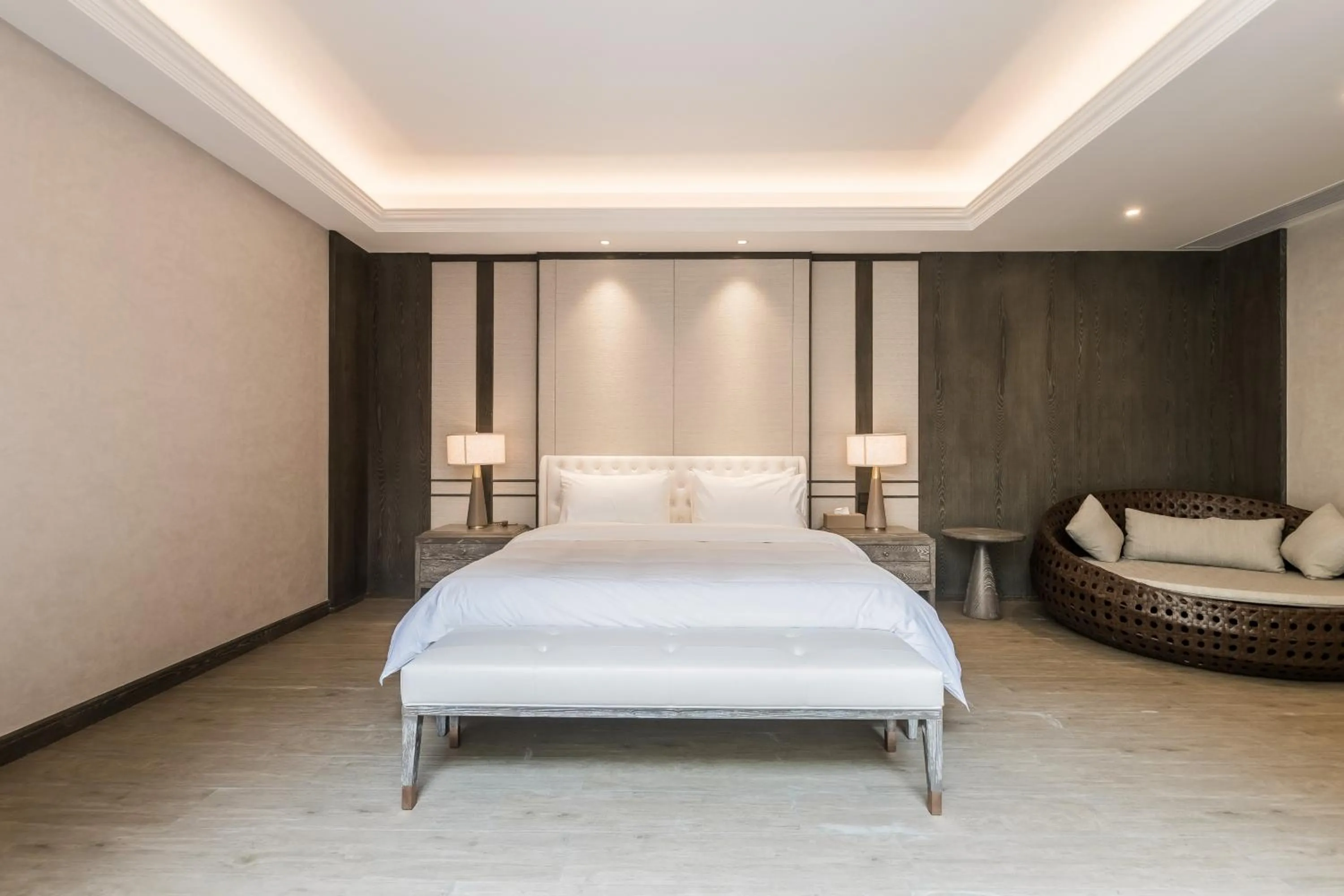 Bed in HaitangBay Loosen Coast Resort Villas