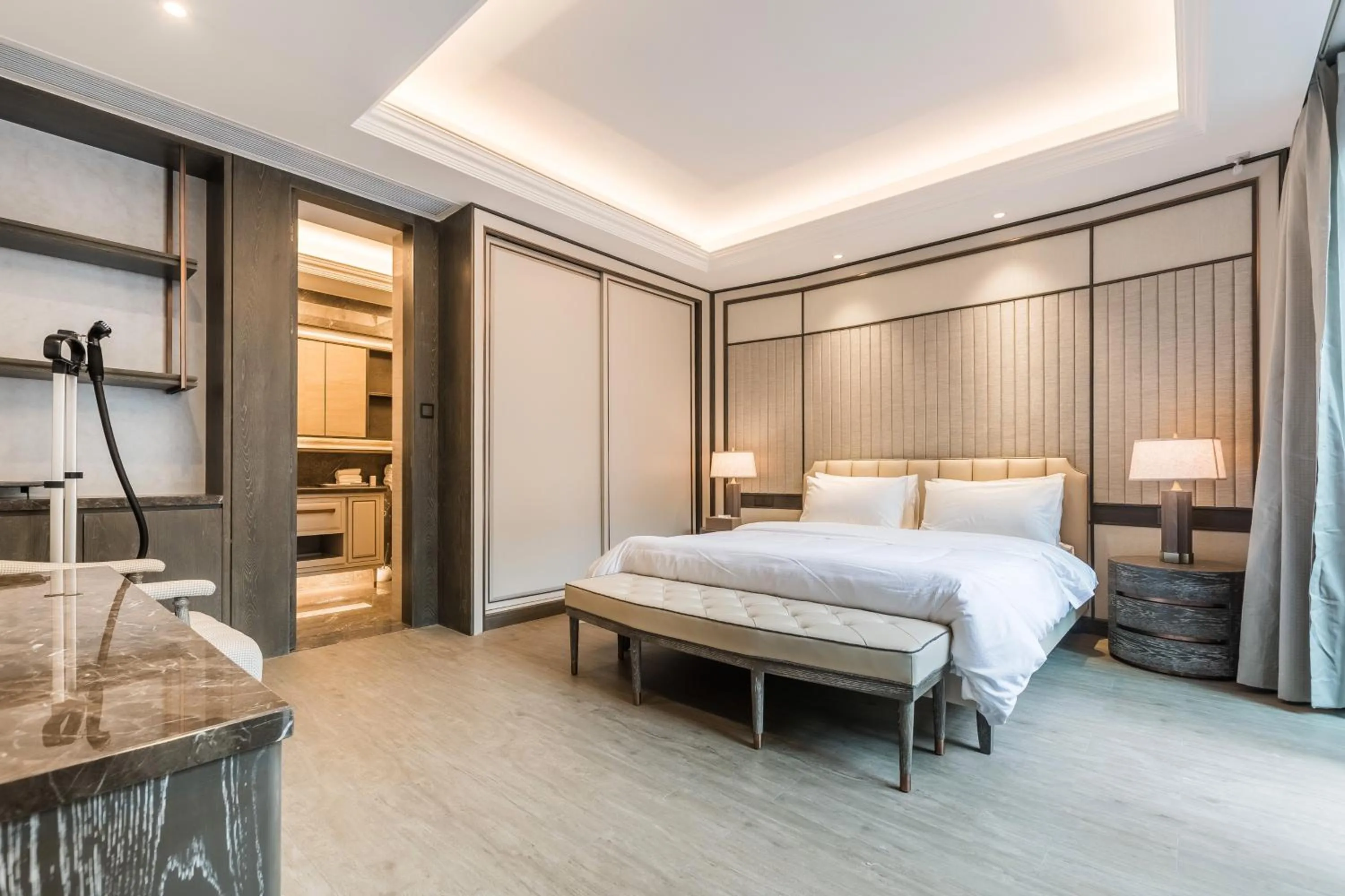 Bed in HaitangBay Loosen Coast Resort Villas