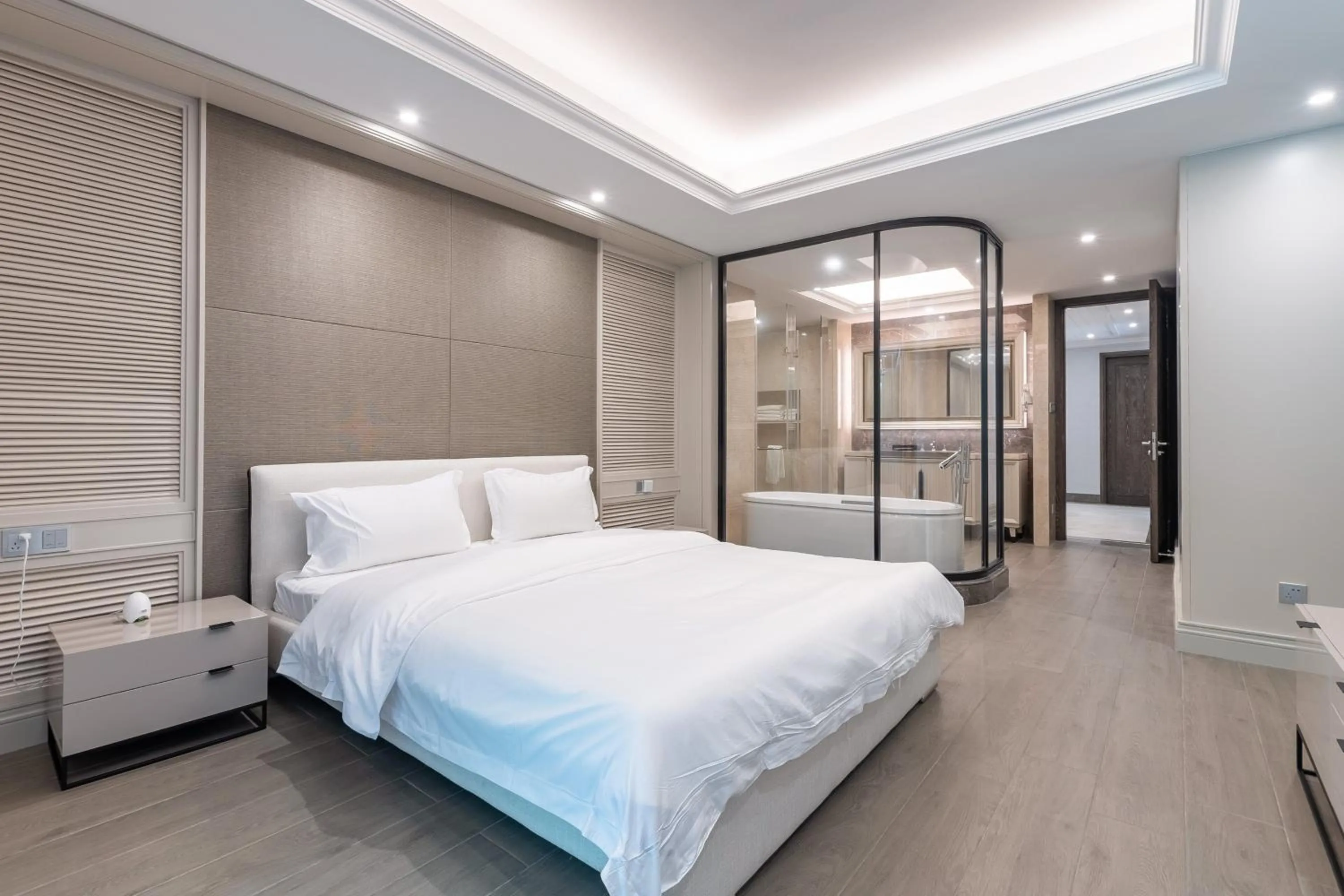 Bed in HaitangBay Loosen Coast Resort Villas