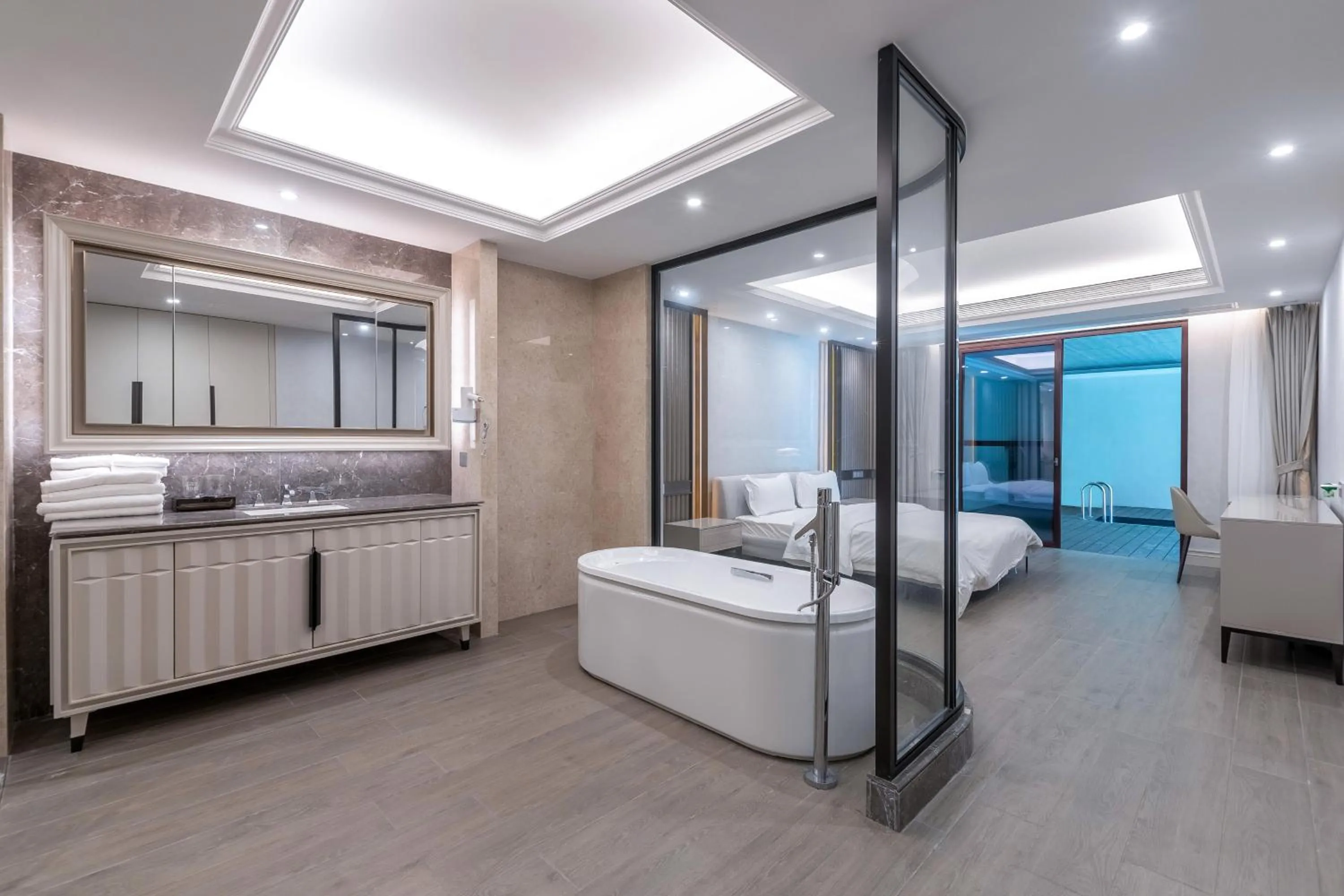 Bed in HaitangBay Loosen Coast Resort Villas