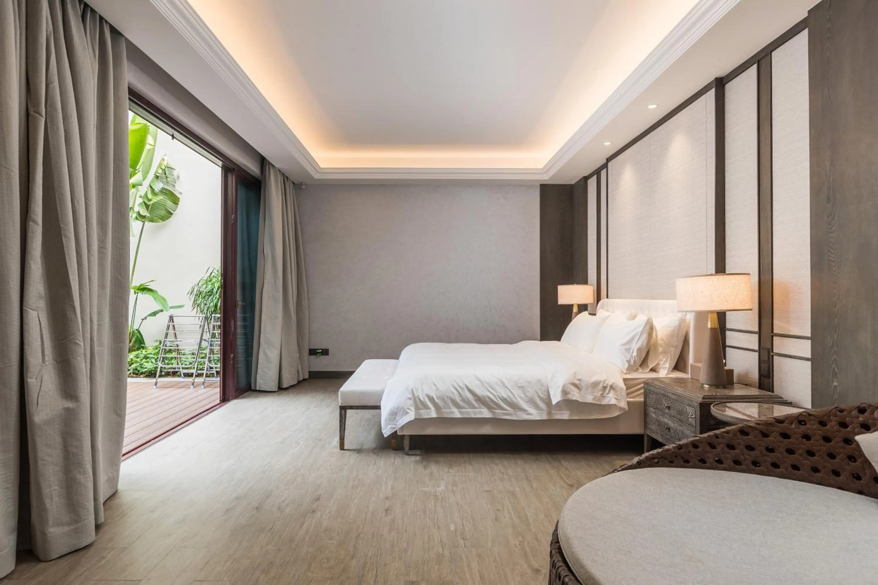 Bed in HaitangBay Loosen Coast Resort Villas