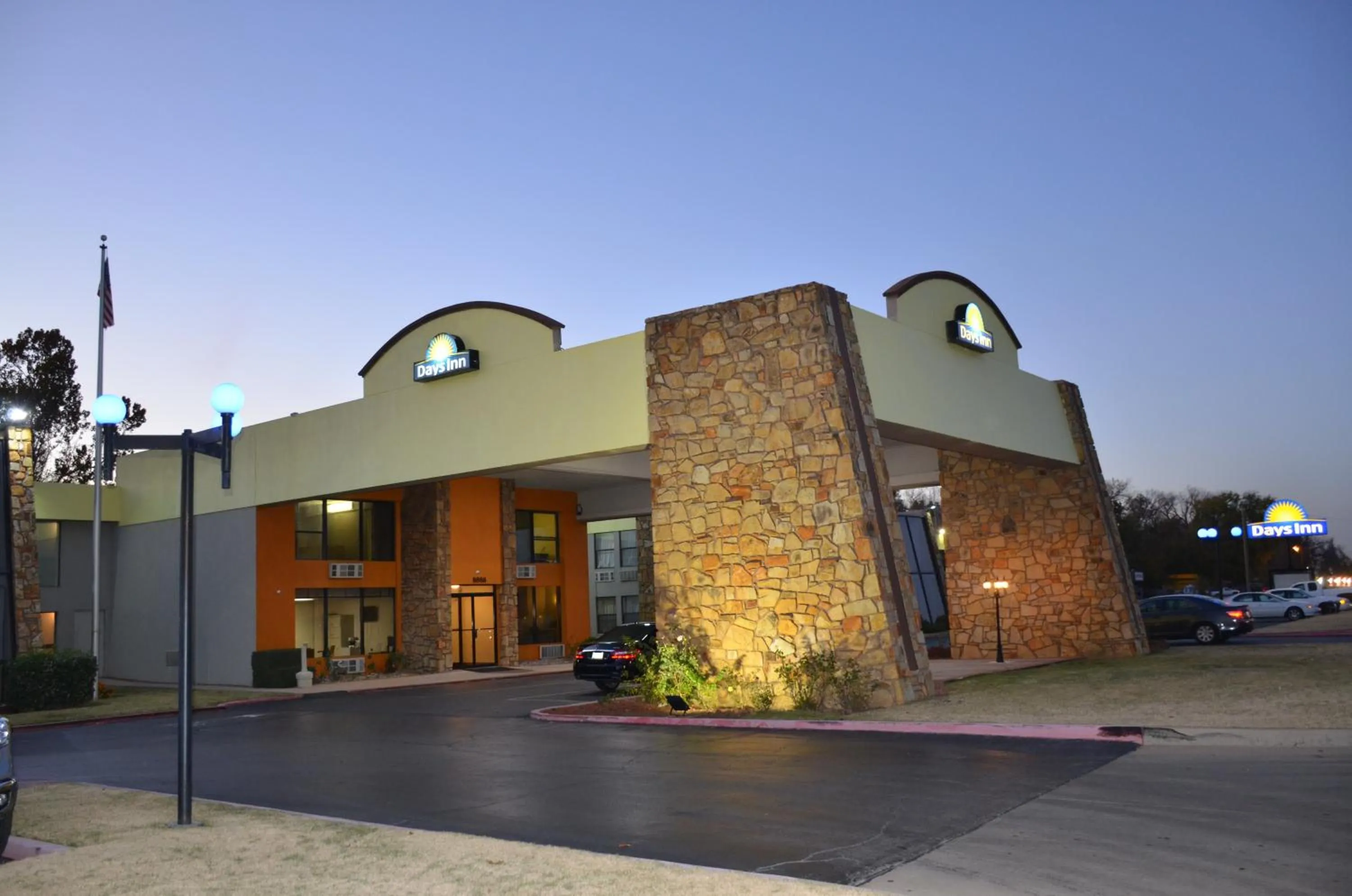 Property building in Days Inn by Wyndham Southern Hills/ORU