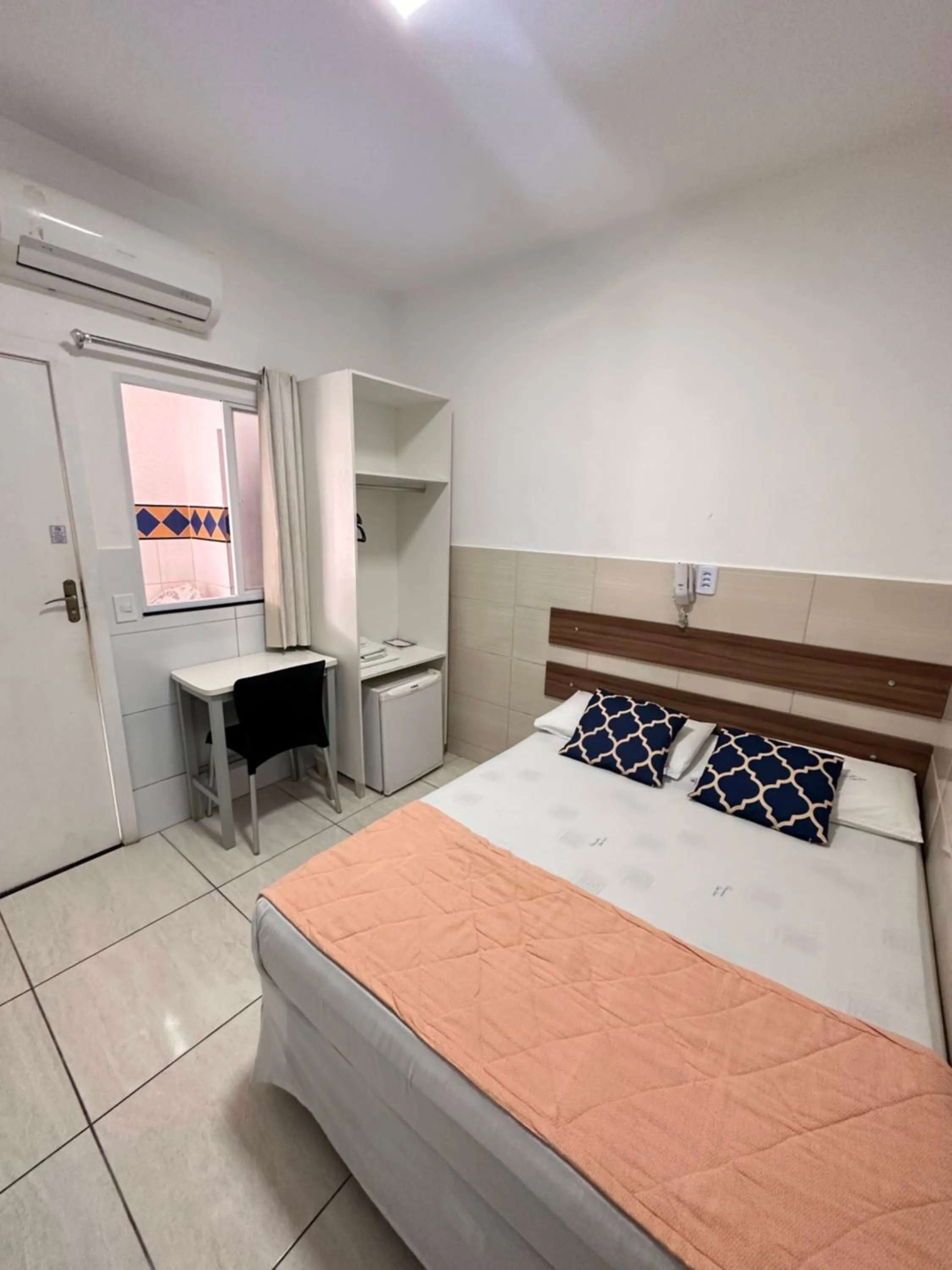 Bed in Pousada São Luiz