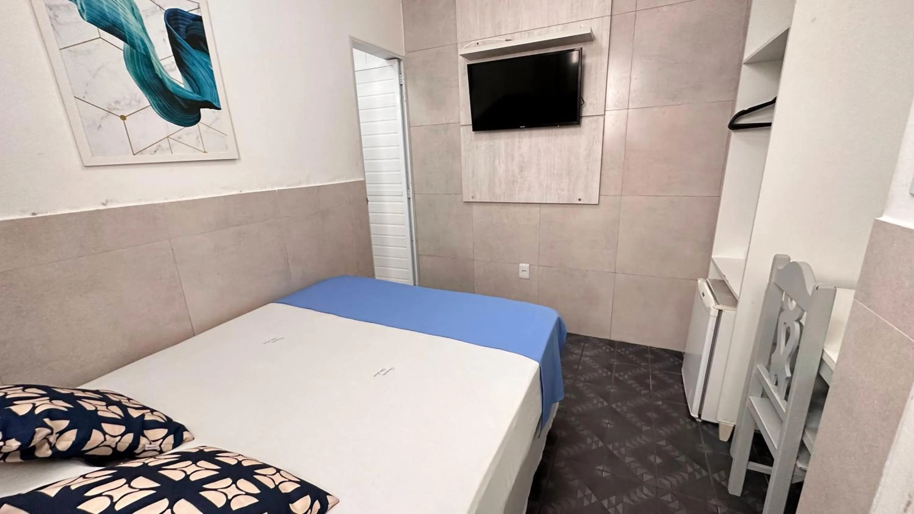 Bed in Pousada São Luiz