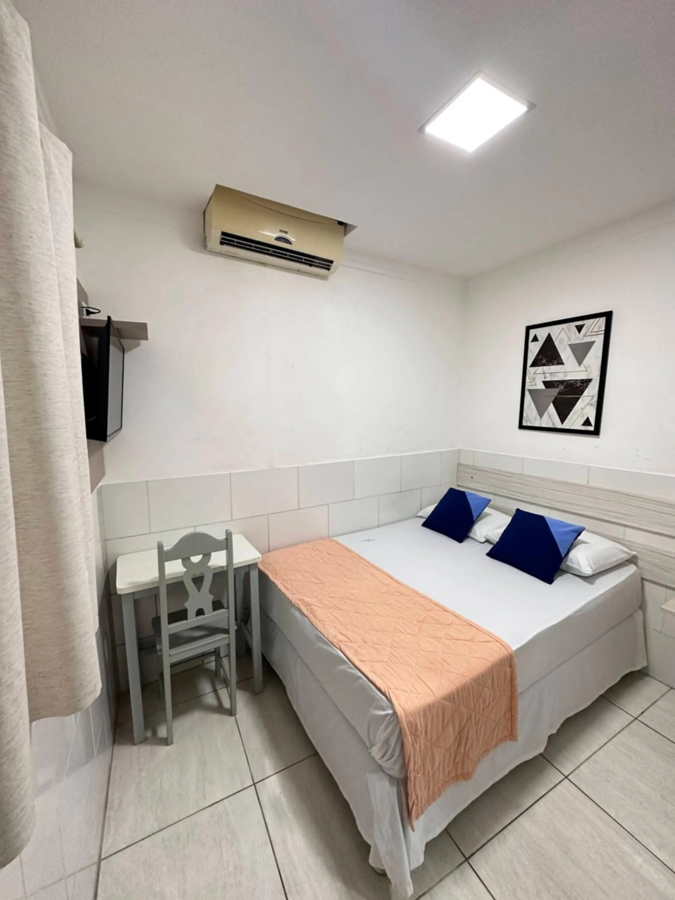 Bed in Pousada São Luiz