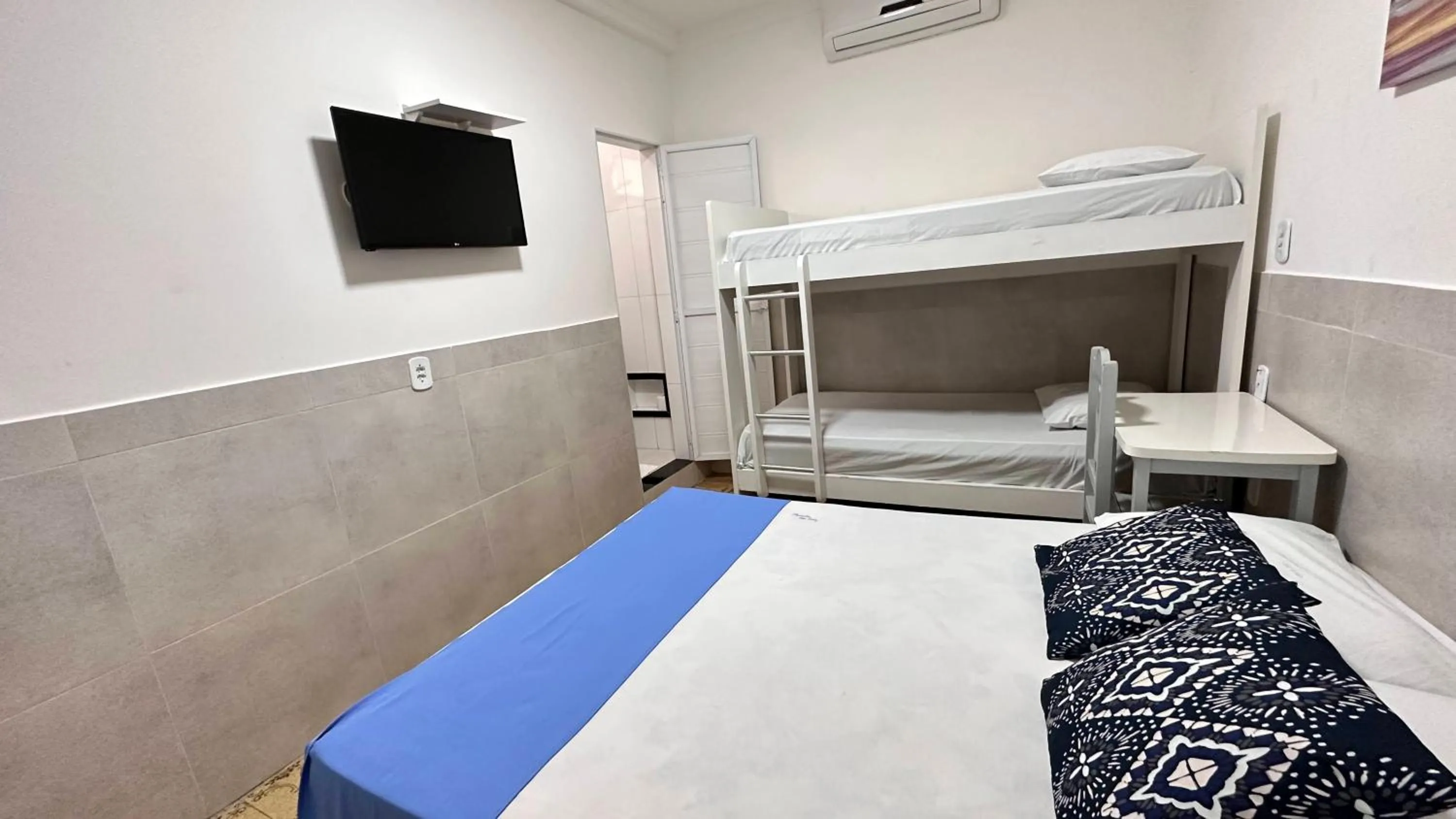 Bed in Pousada São Luiz