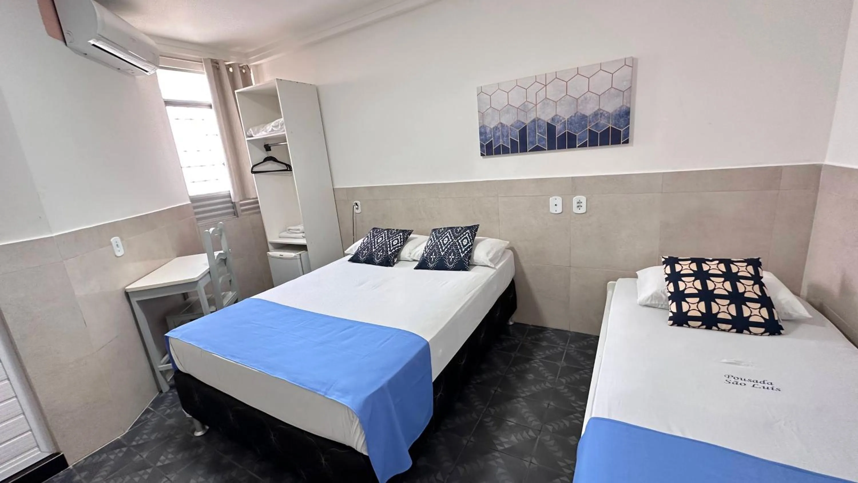 Bed in Pousada São Luiz