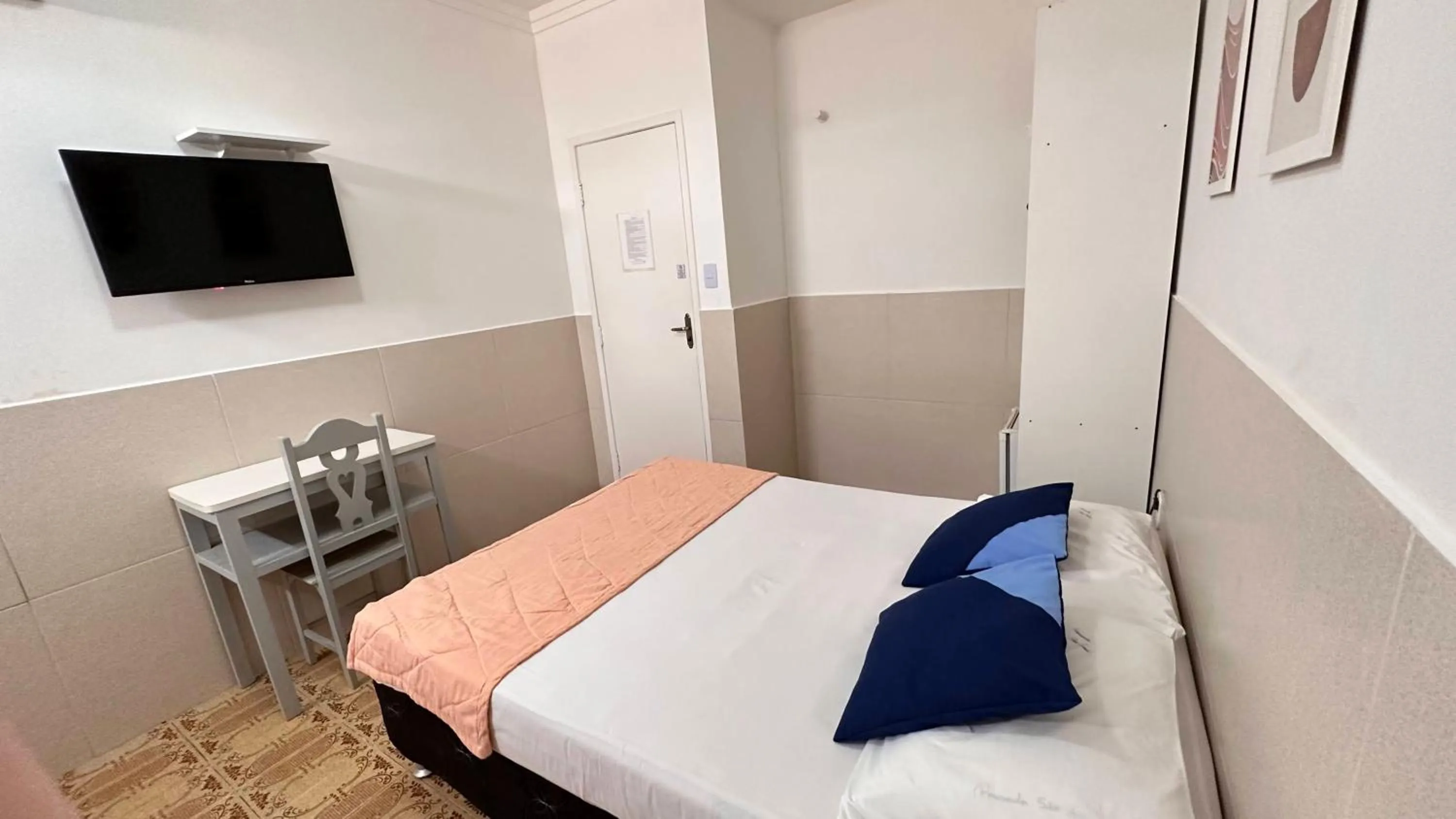 Bed in Pousada São Luiz