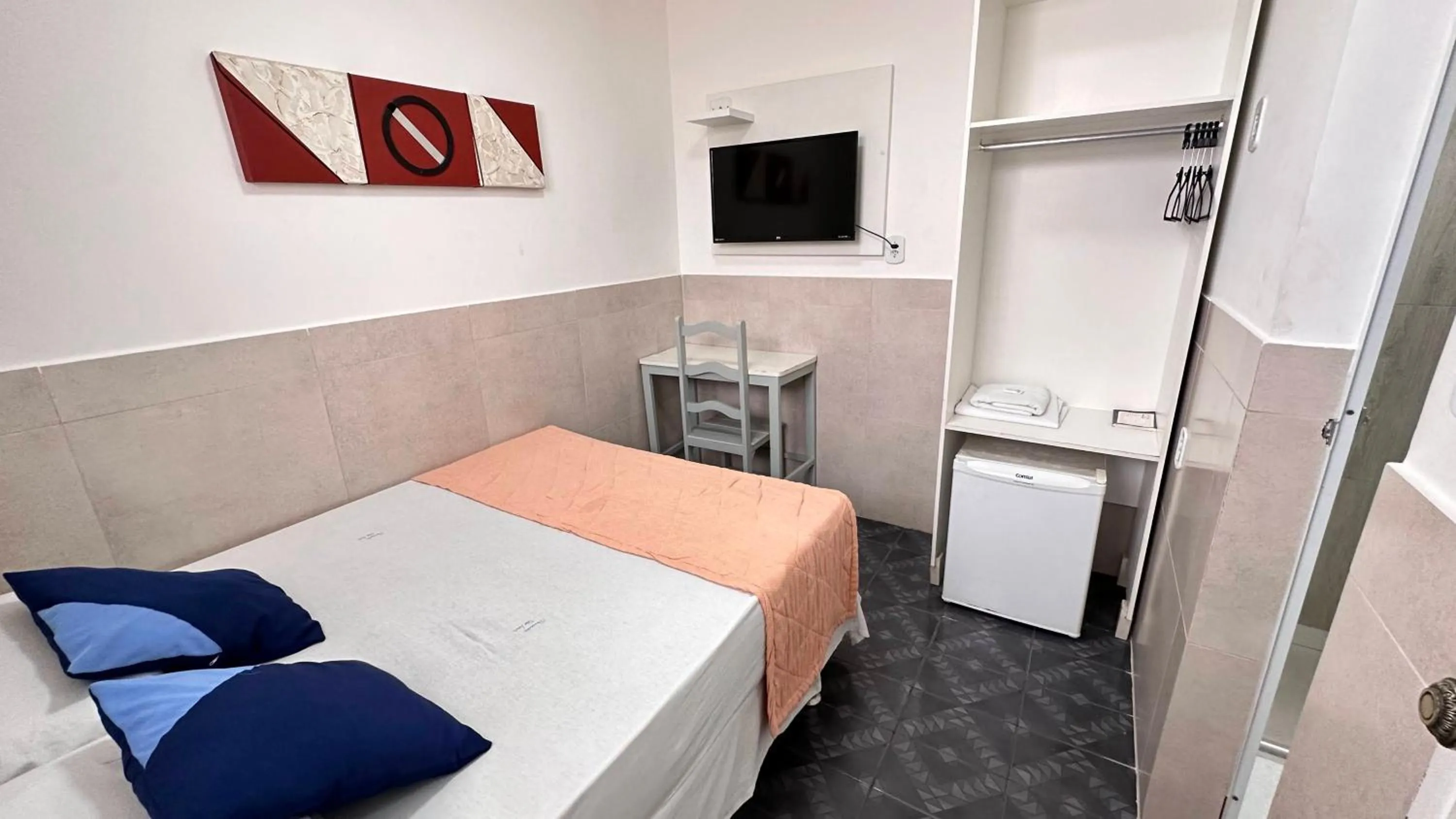 Bed in Pousada São Luiz