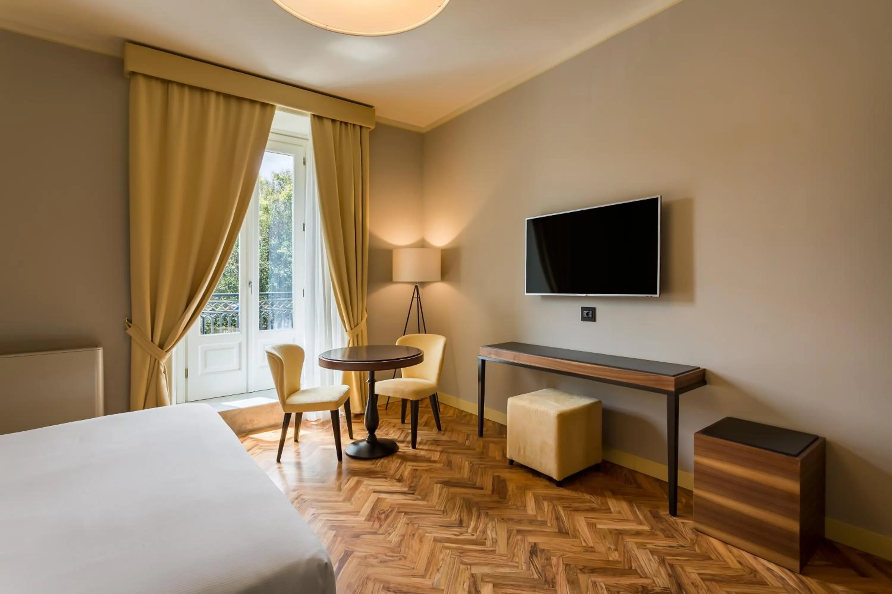 TV and multimedia, Bed in Room Of Andrea Hotel