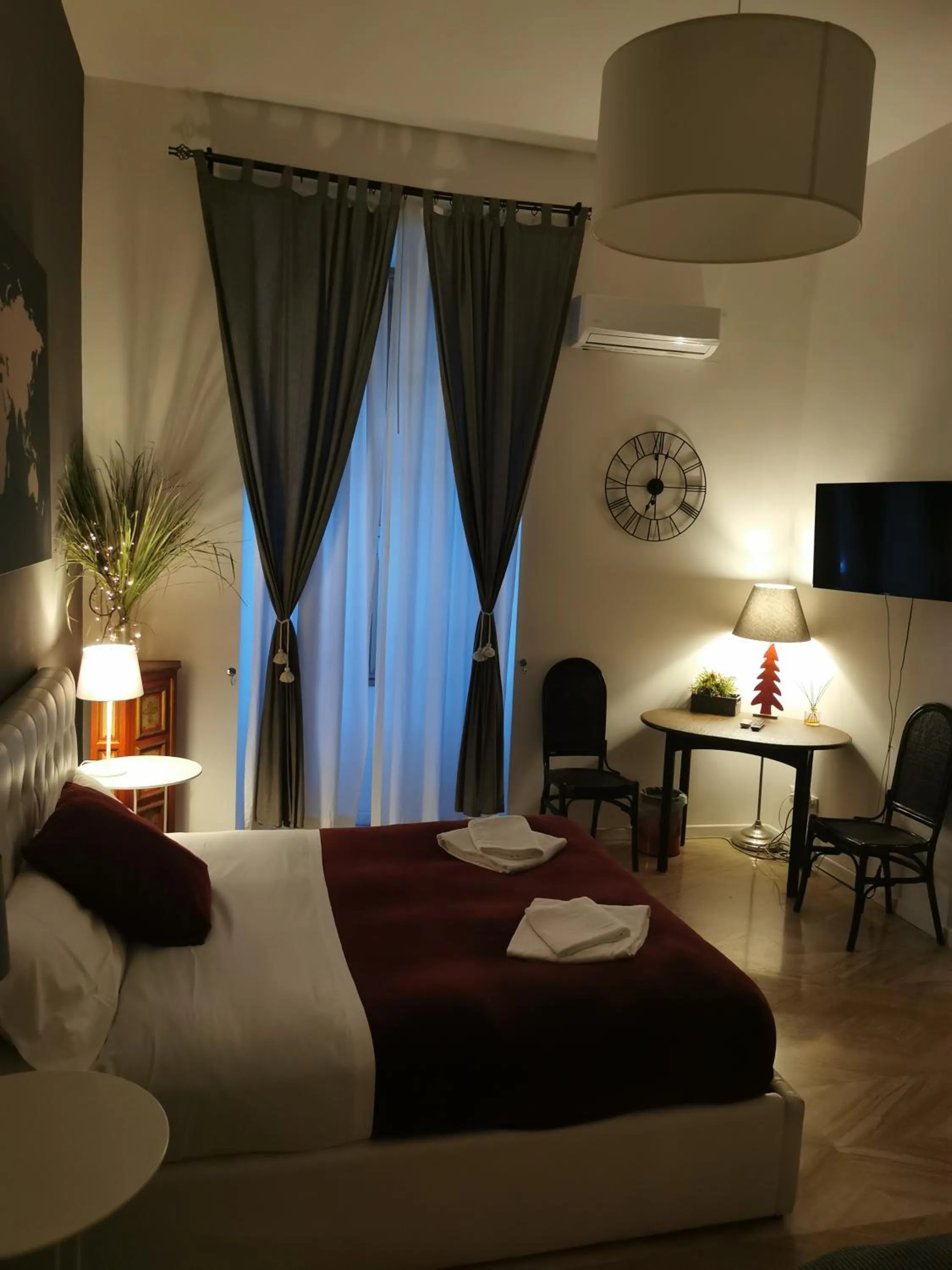 Bed in 109 SUITES ROMA