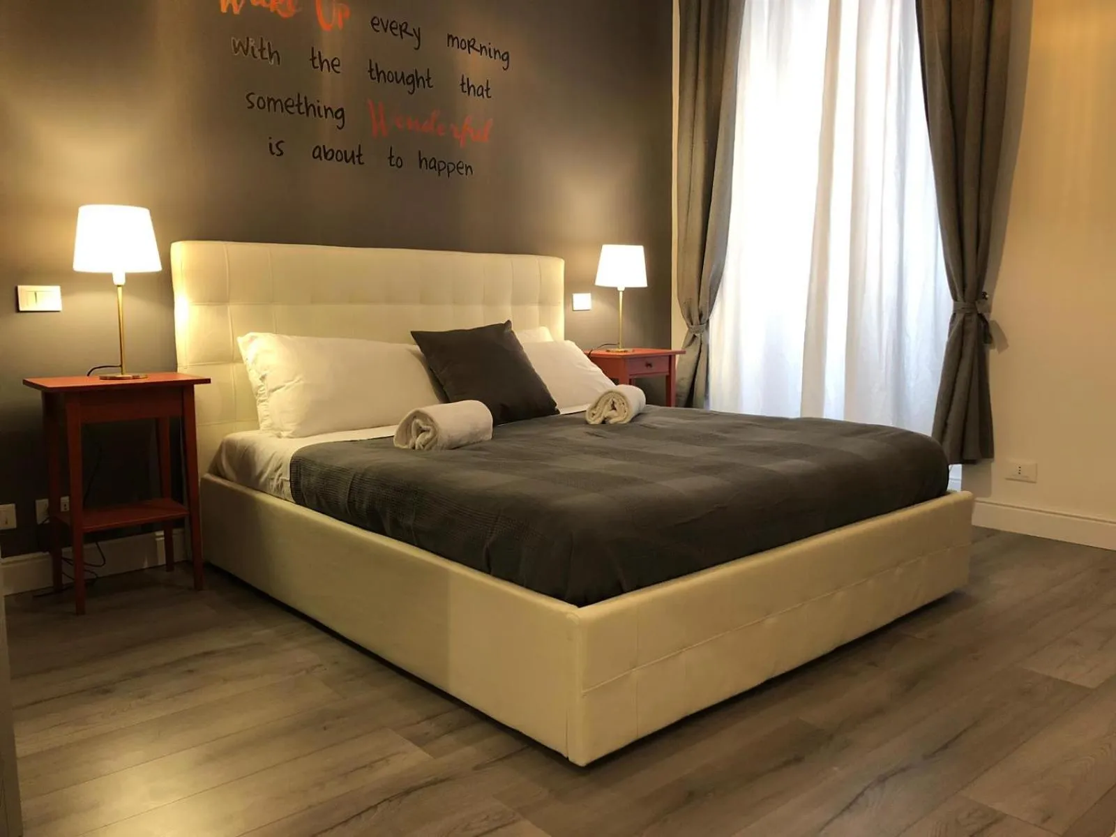 Bed in 109 SUITES ROMA