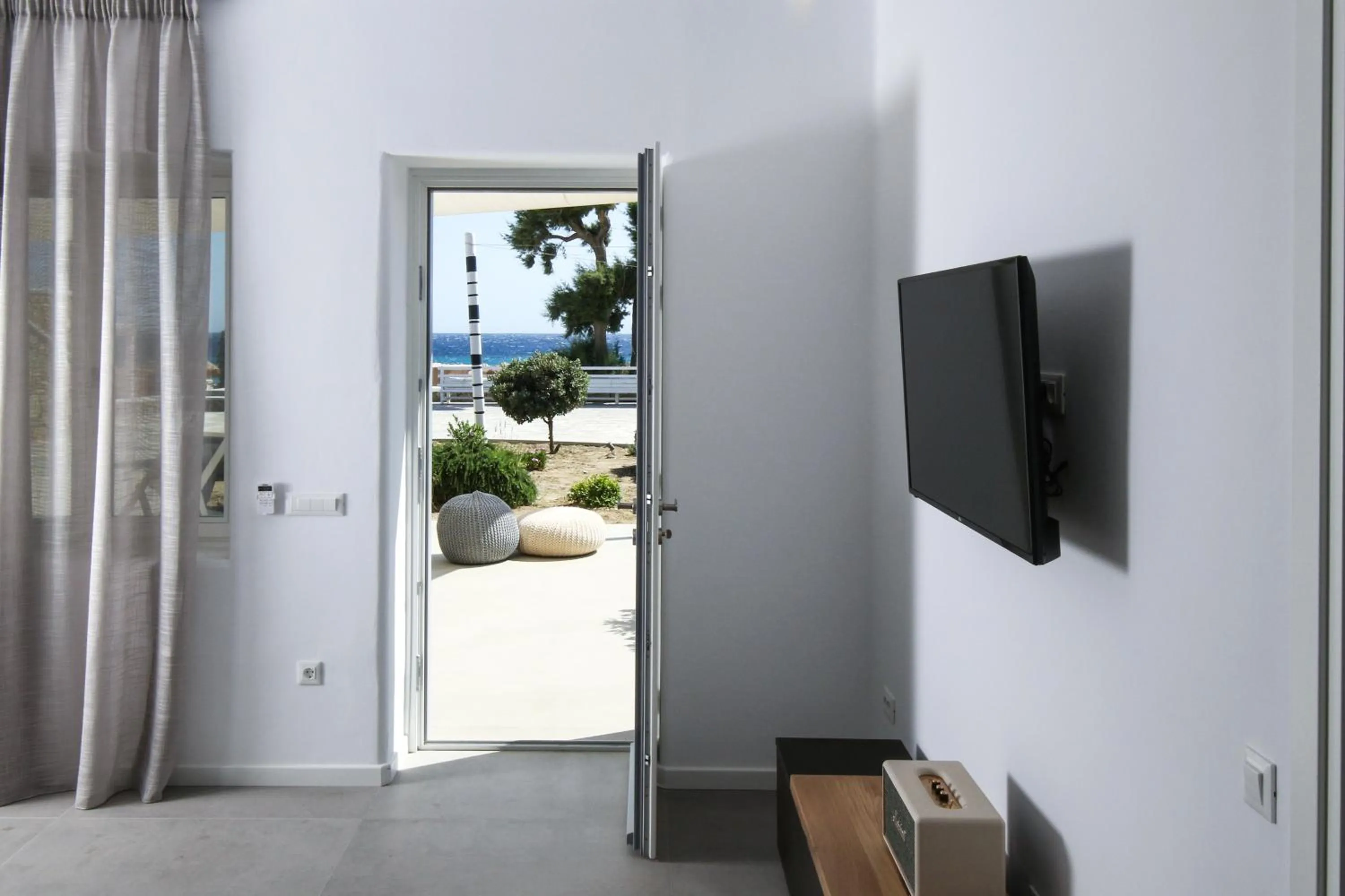 Communal lounge/ TV room in Elia Mykonos Resort