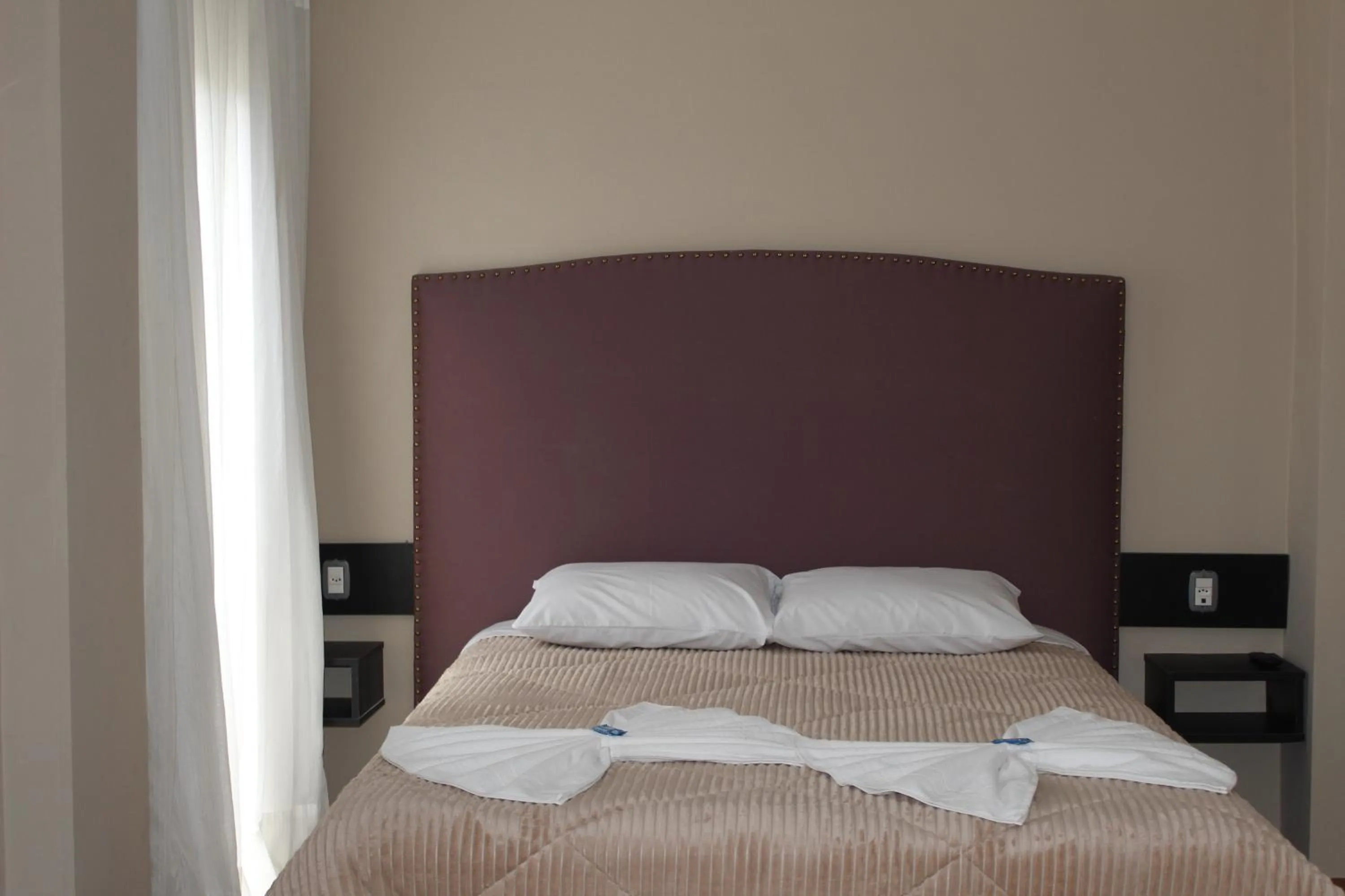 Bed in Pousada Essência Serrana Gramado