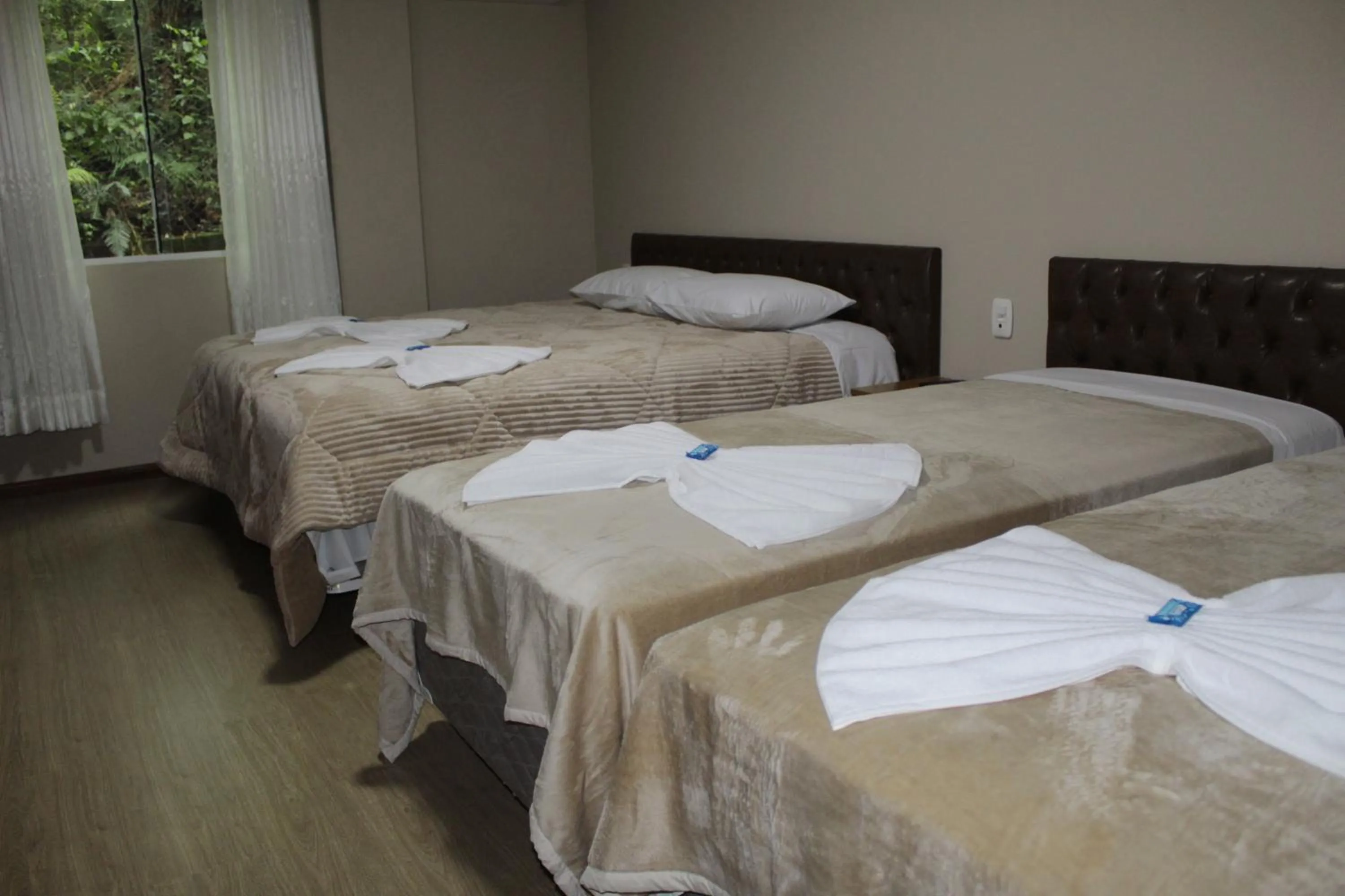 Bed in Pousada Essência Serrana Gramado