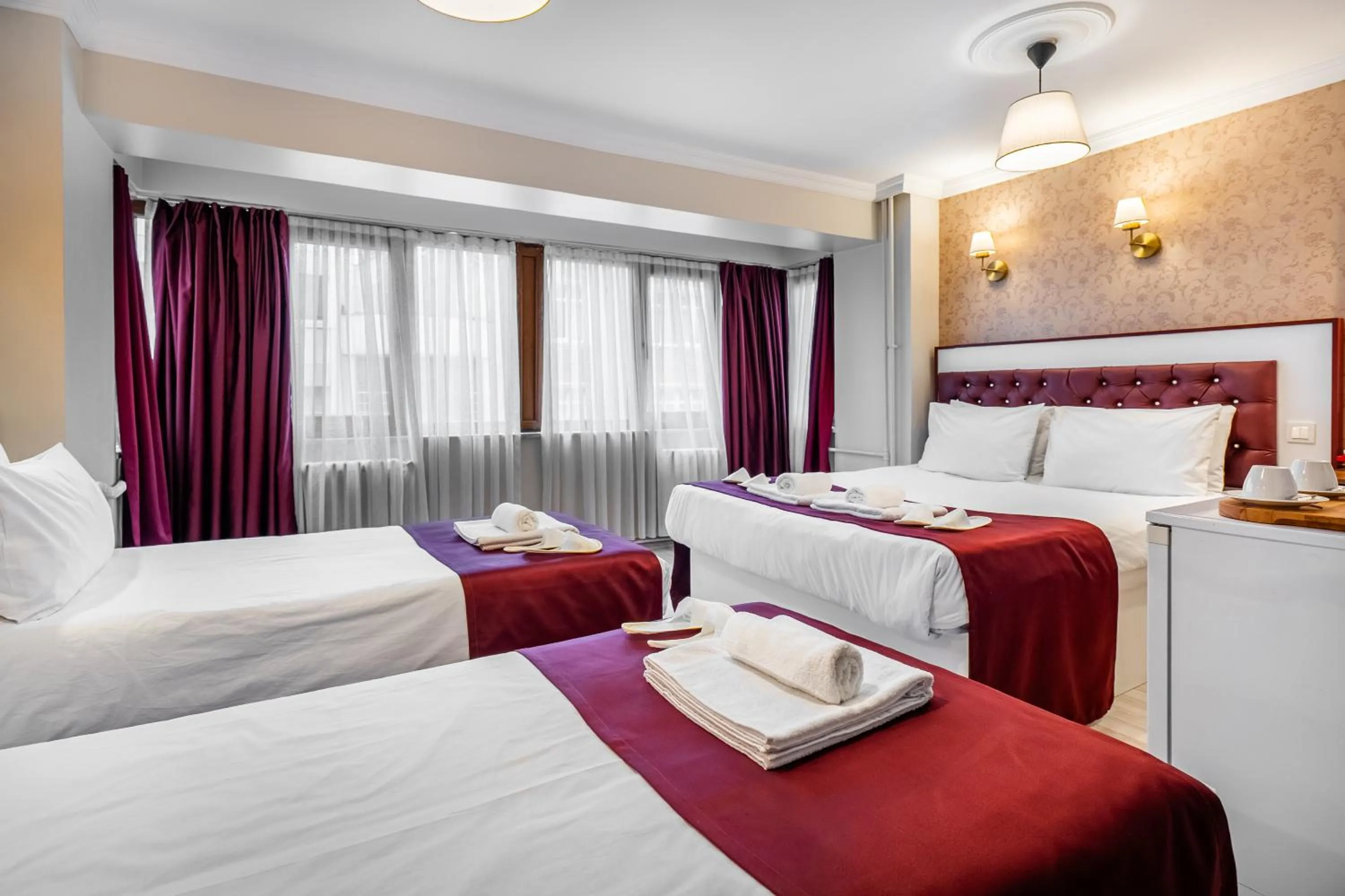 Bed in Cihangir Palace Hotel