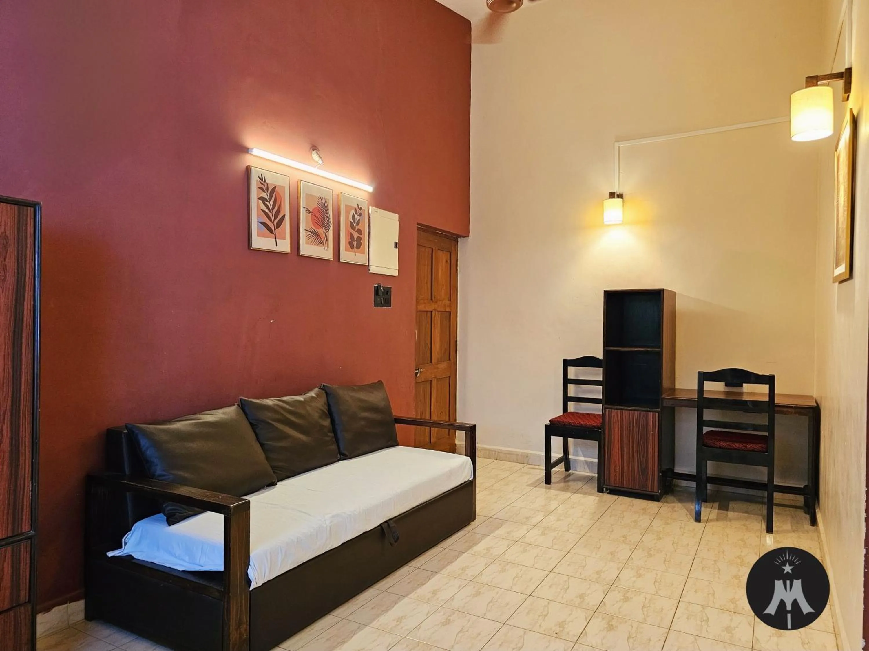 Living room, Bed in Bijou Guest House