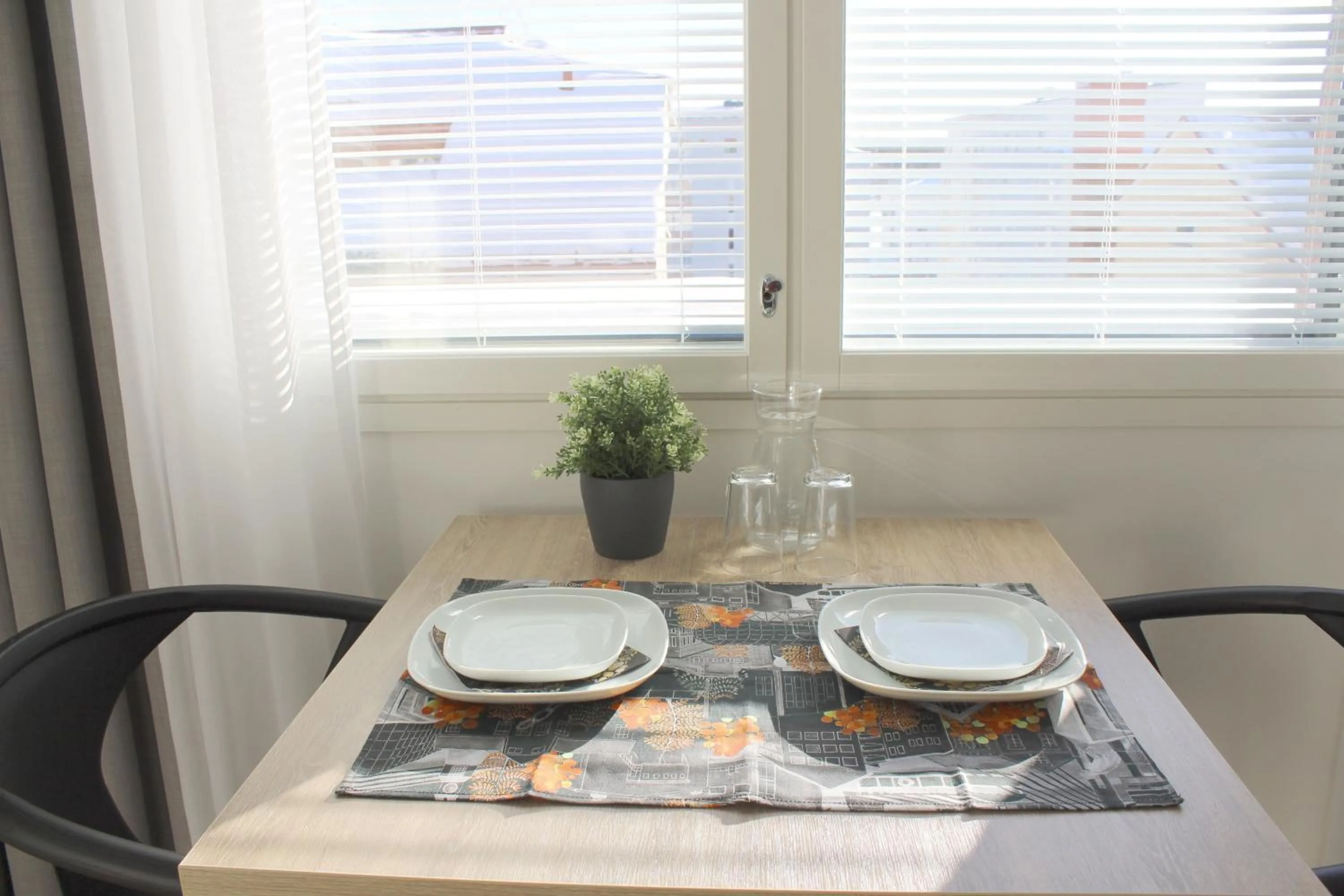 Dining area in Forenom Serviced Apartments Rovaniemi Valtakatu