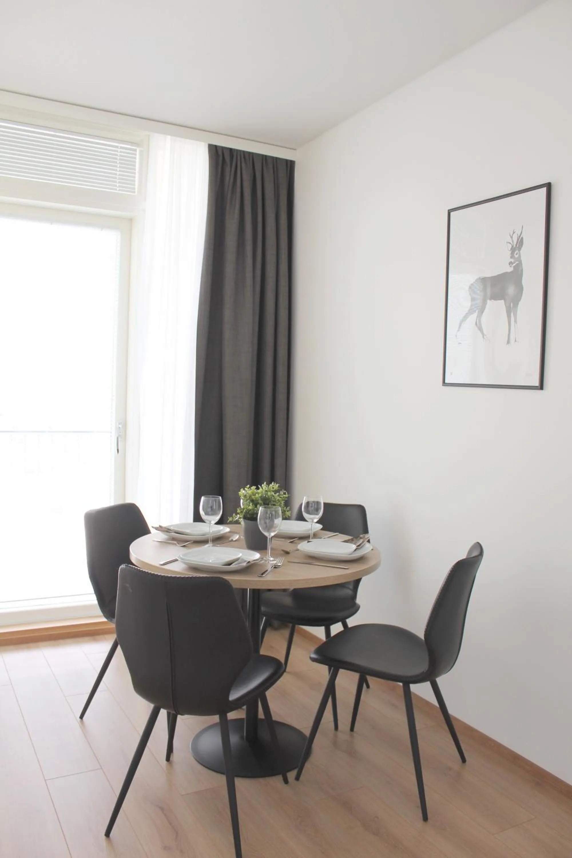 Dining area in Forenom Serviced Apartments Rovaniemi Valtakatu