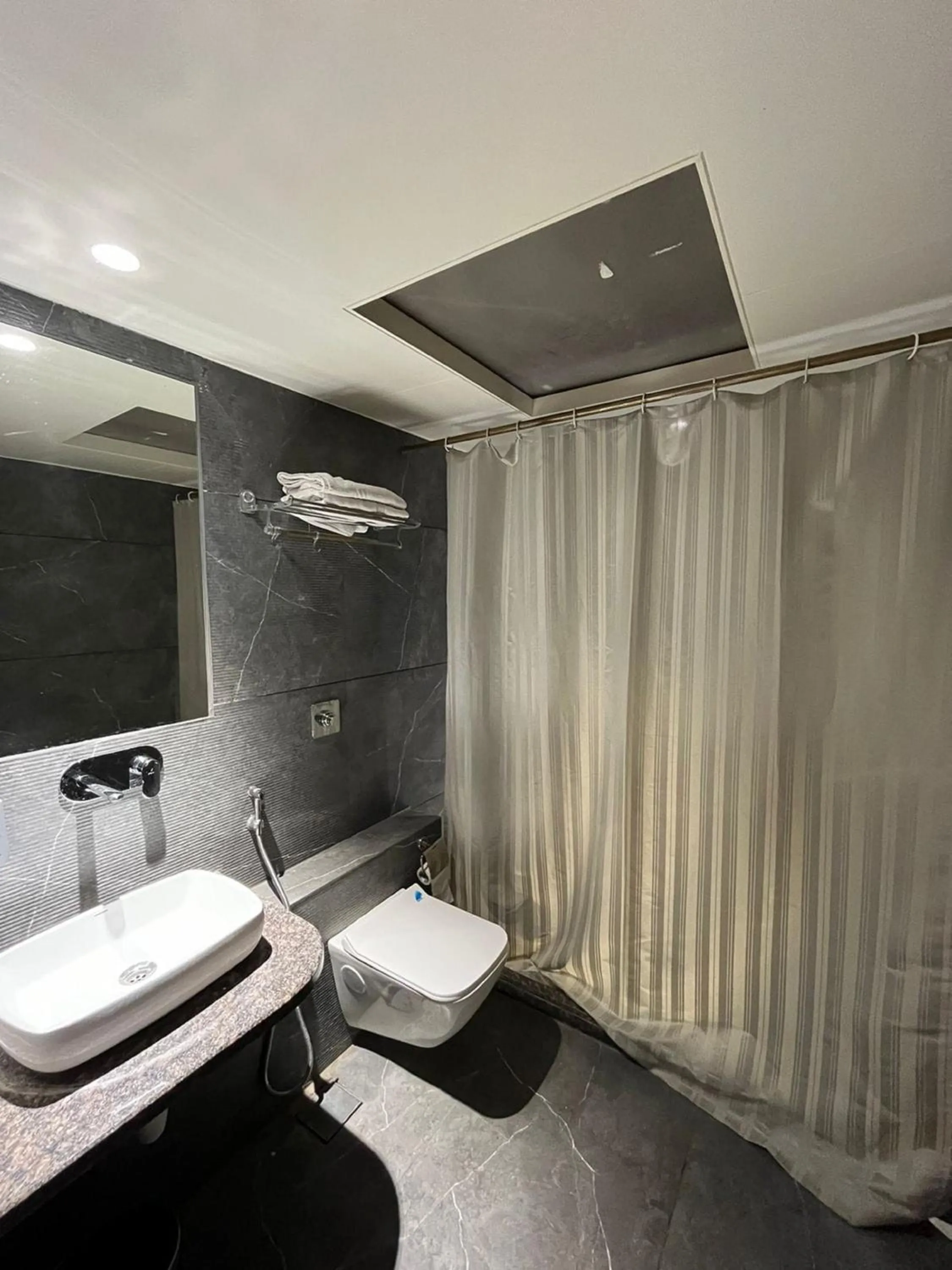 Toilet in Hotel Sadanand Regency - A Regal Stay for the Modern Professional