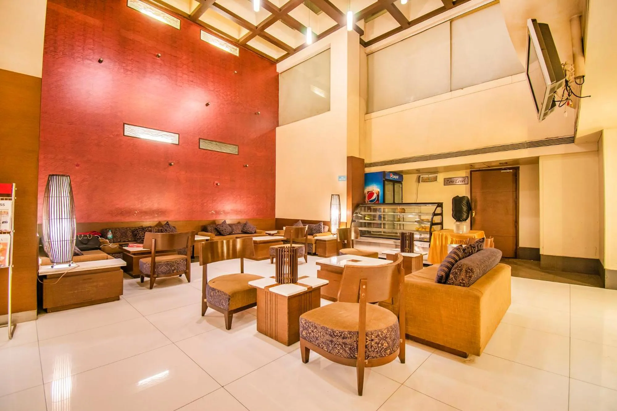 Seating area in Hotel Sadanand Regency - A Regal Stay for the Modern Professional