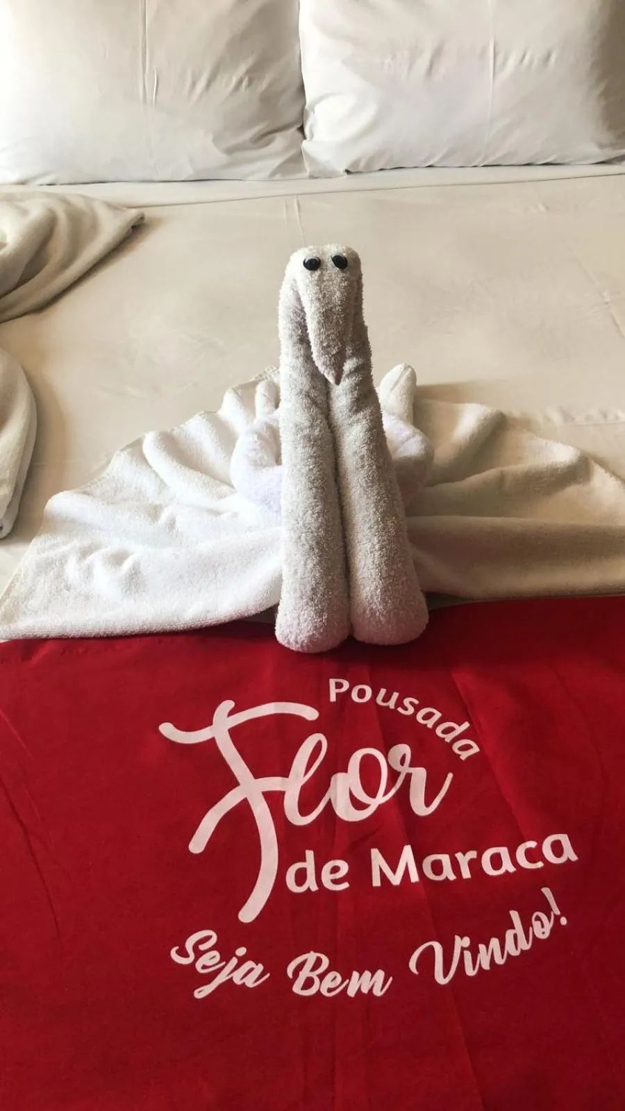 Bed in Pousada Flor de Maraca