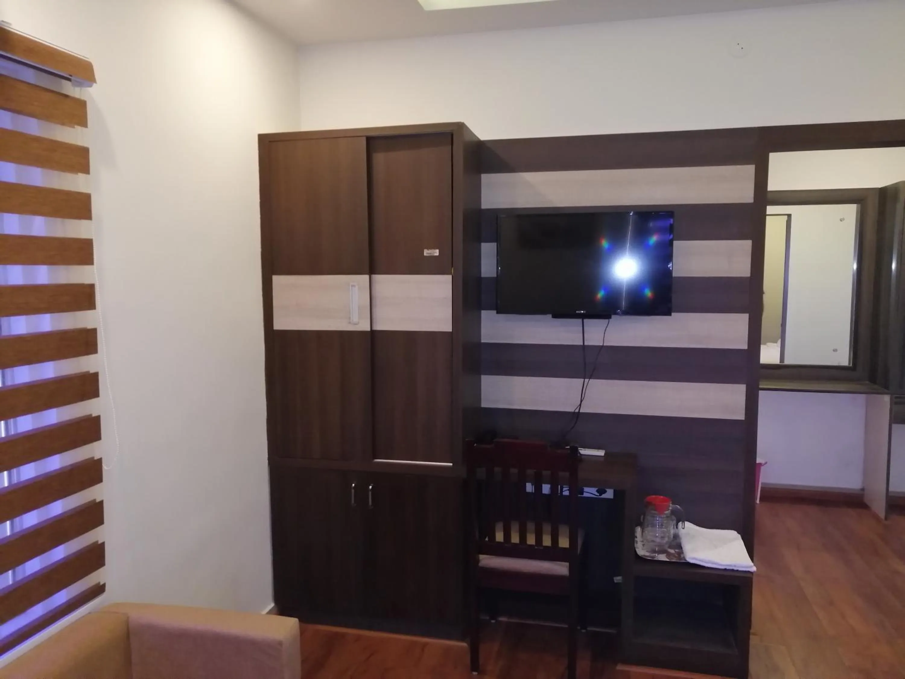 wardrobe in The Orchid Suites