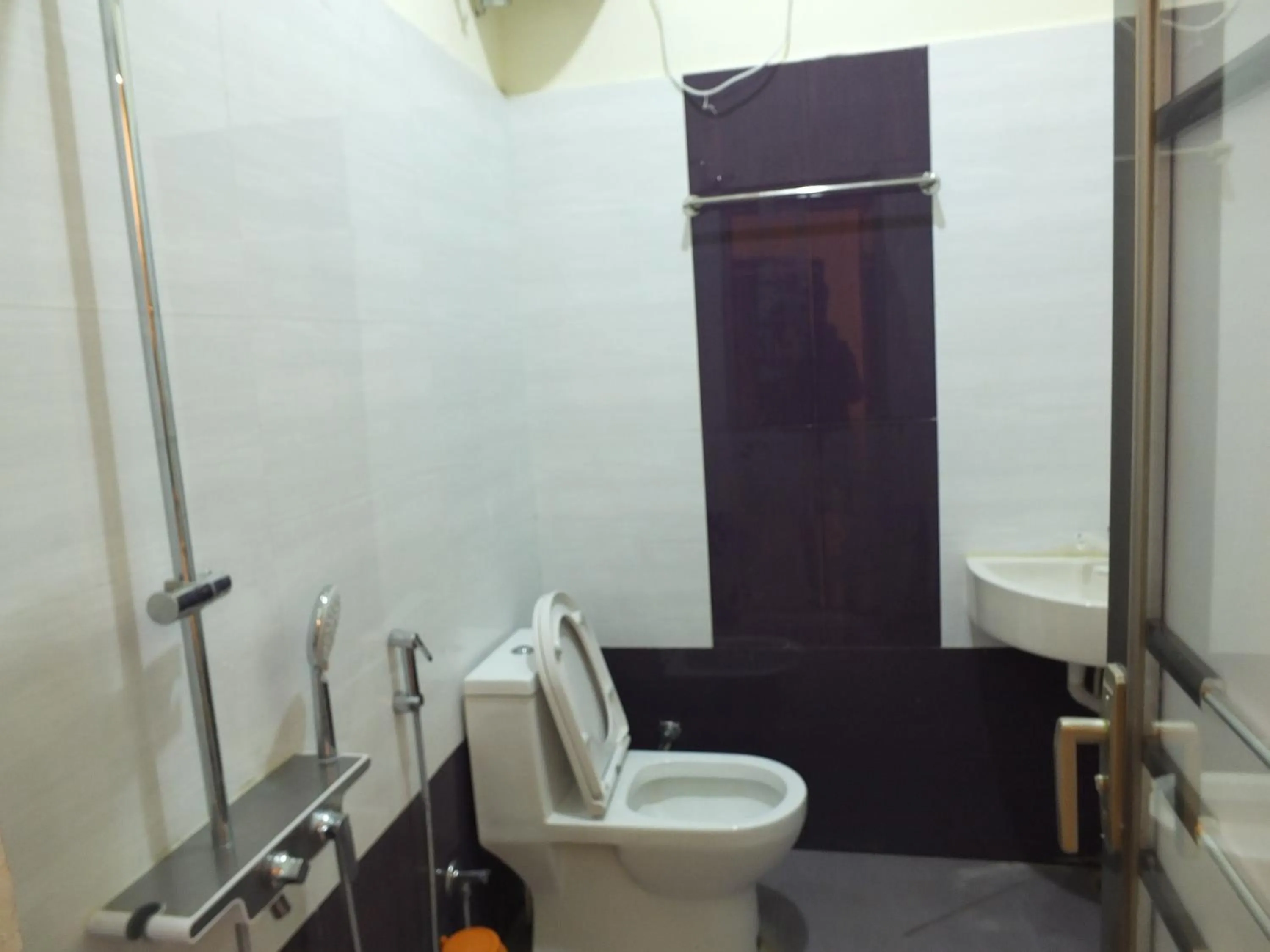 Bathroom in Sushmika Resorts Inn