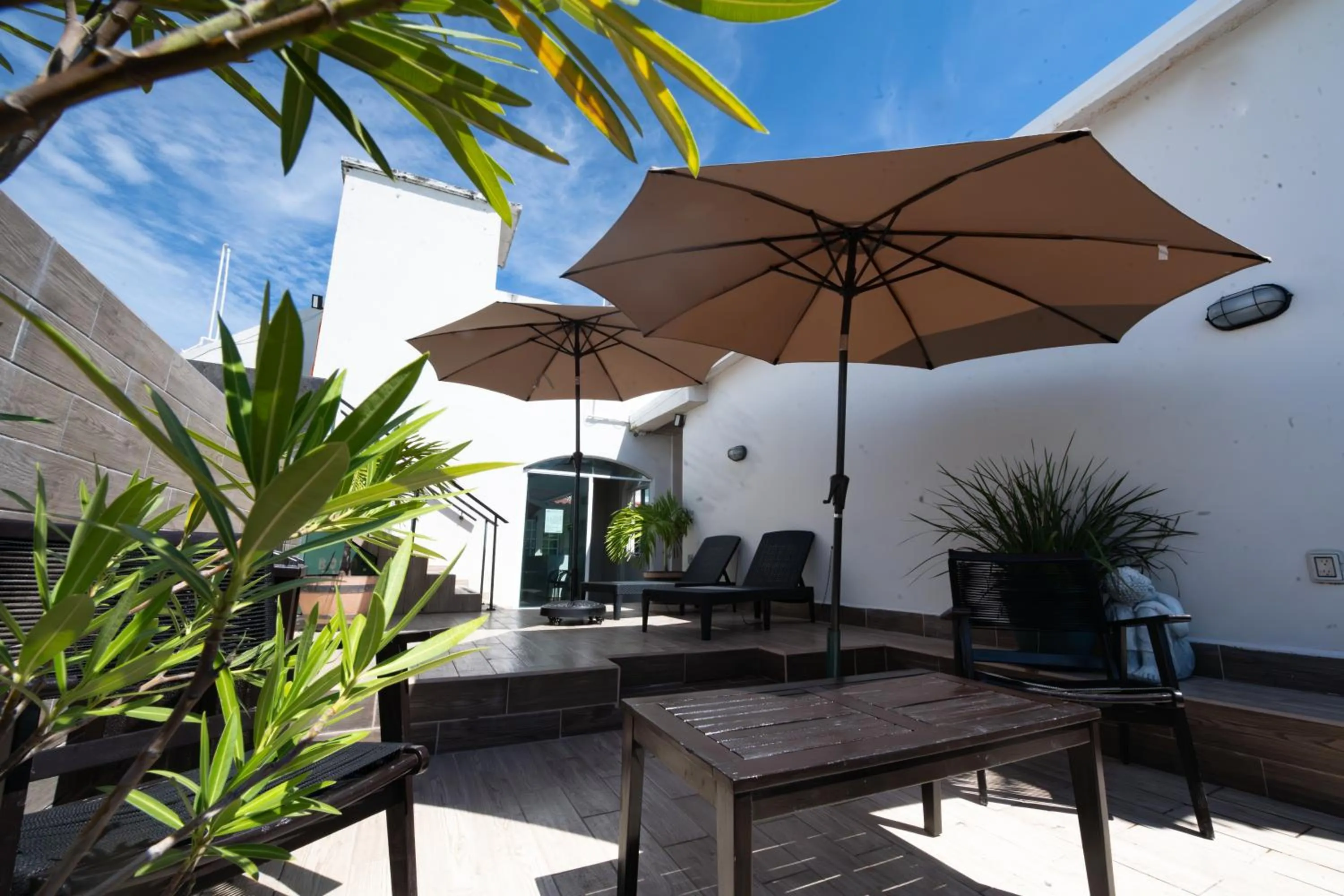 Swimming pool in Boca Inn Hotel & Suites