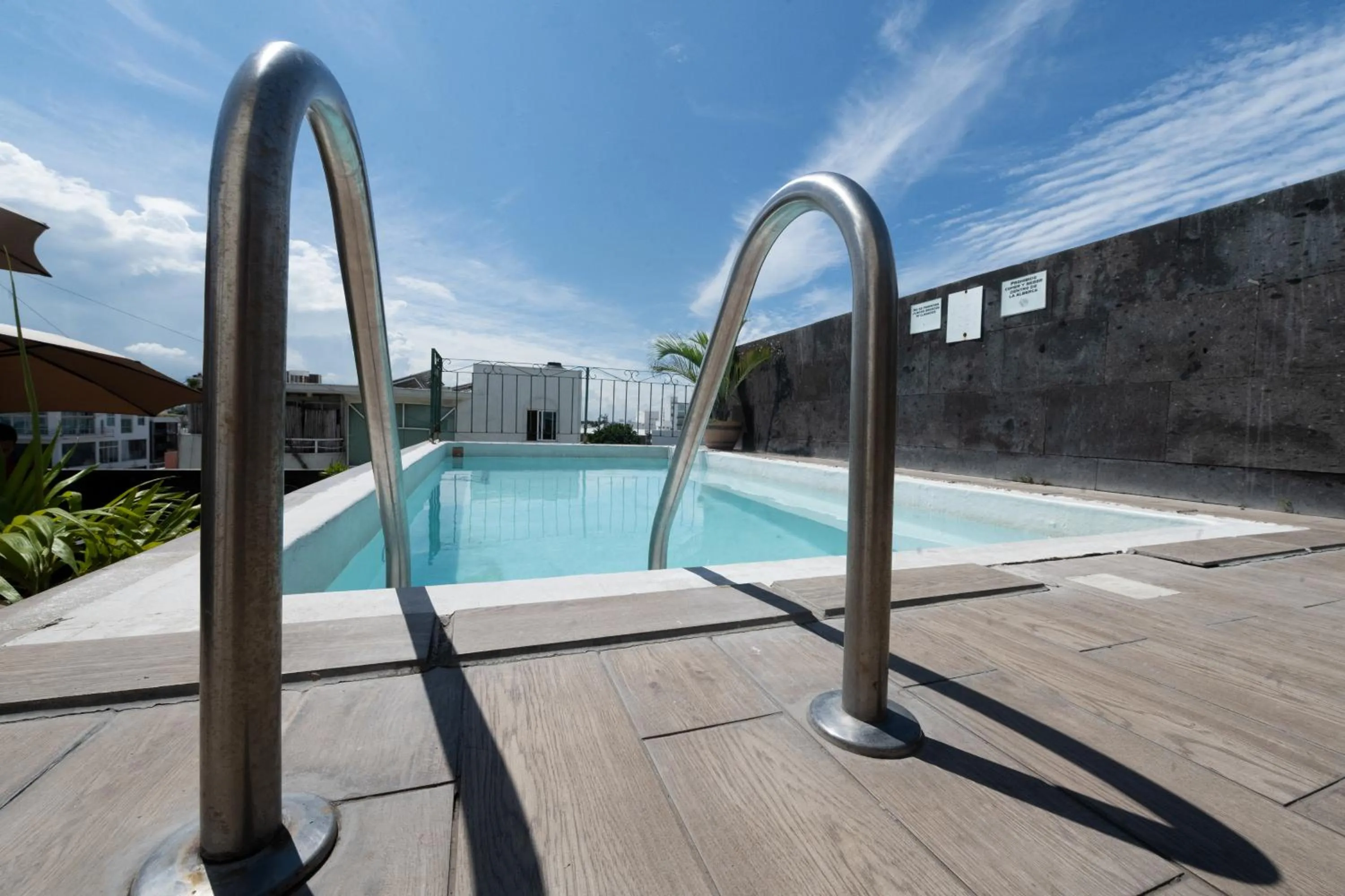 Swimming pool in Boca Inn Hotel & Suites