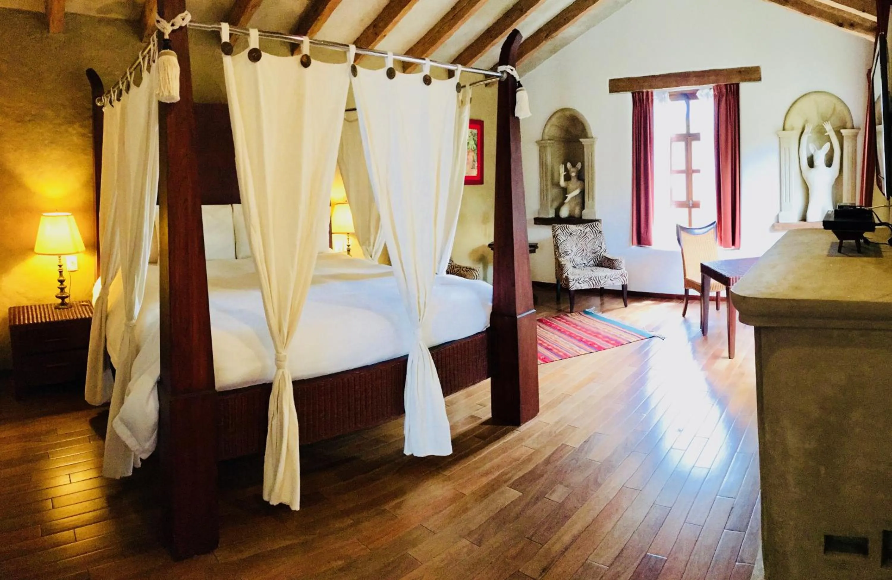 Photo of the whole room, Bed in Guayaba Inn Boutique Hotel