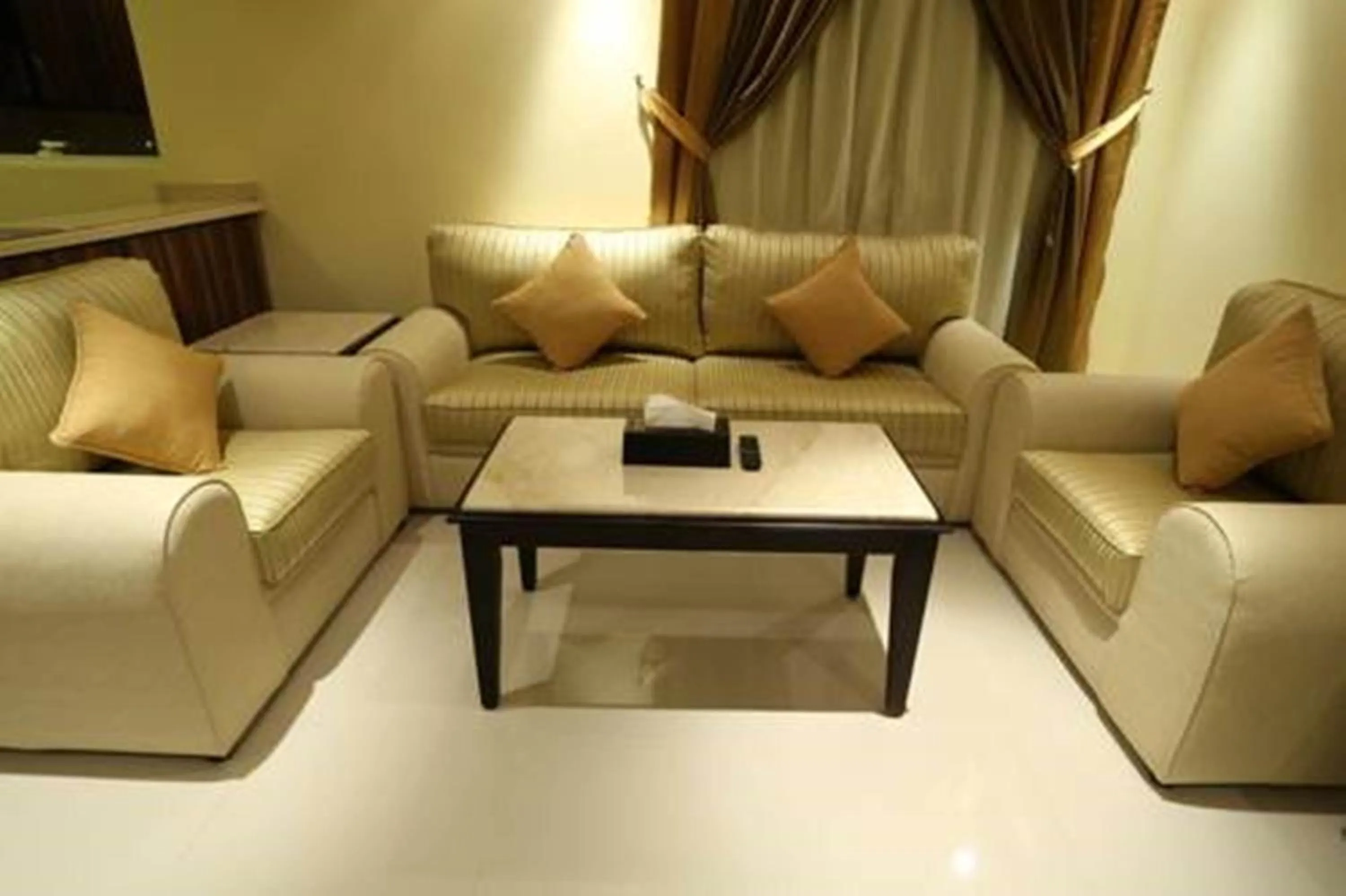 Living room in شقق توليب الروضه للشقق المخدومة