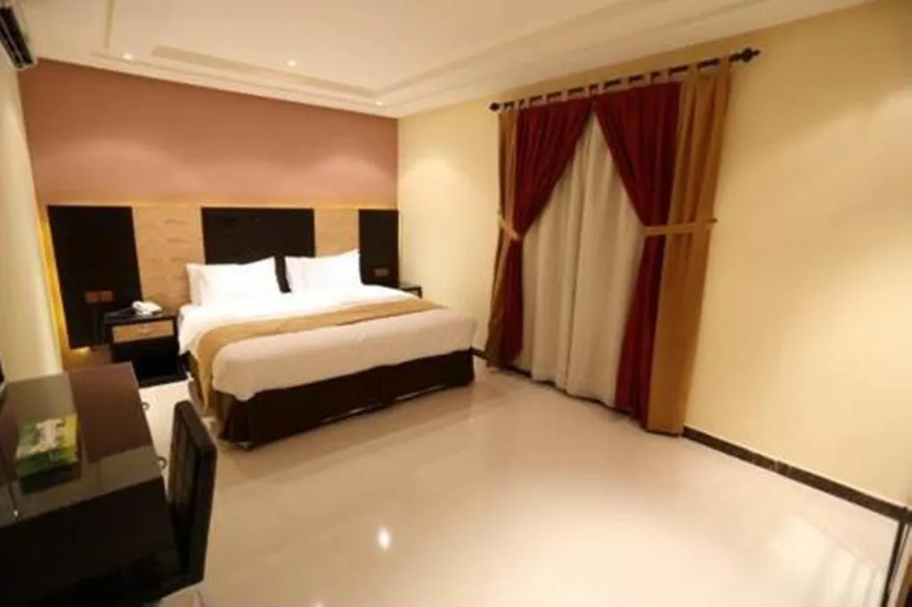 Photo of the whole room, Bed in شقق توليب الروضه للشقق المخدومة