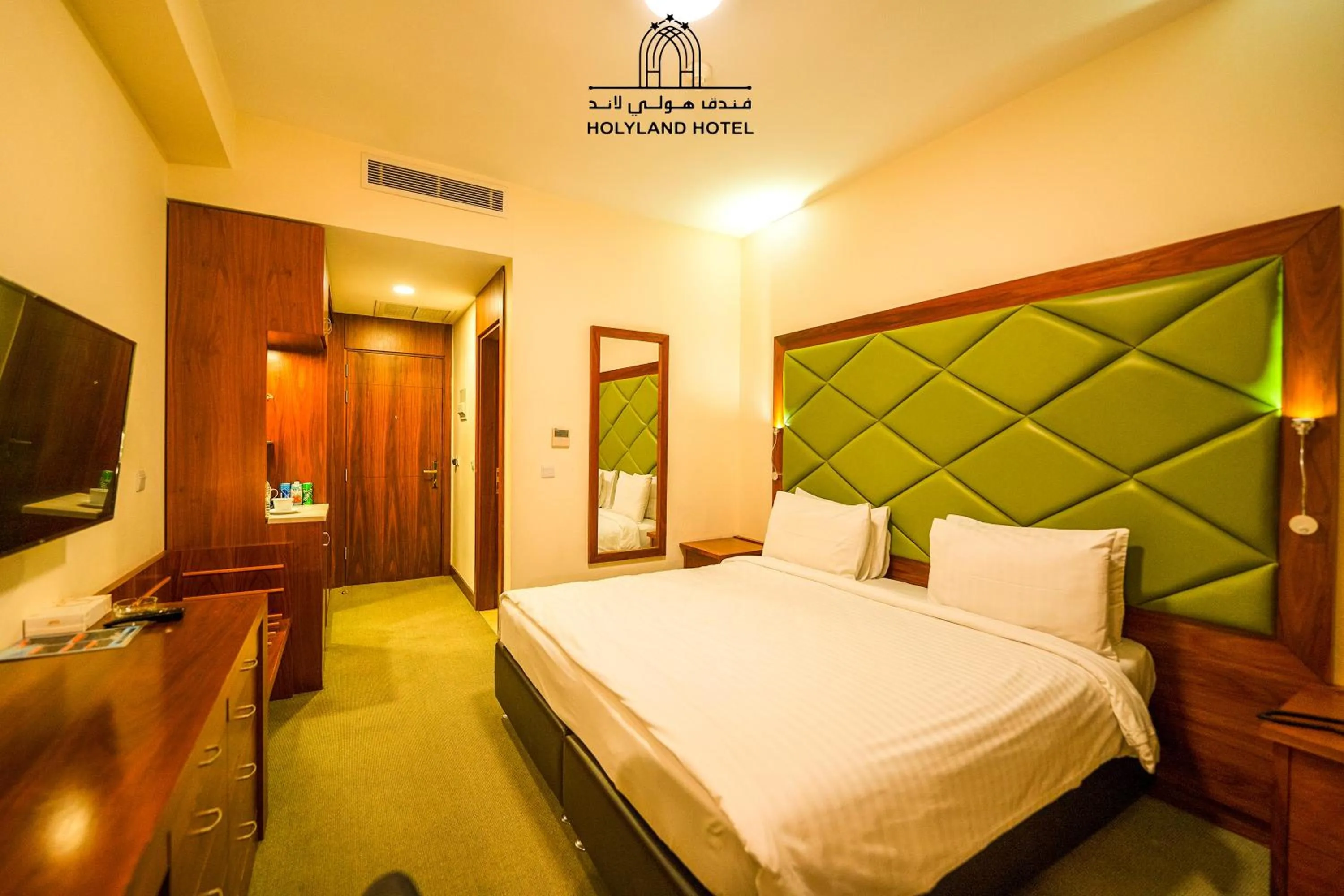 Bed in Holyland Hotel Amman