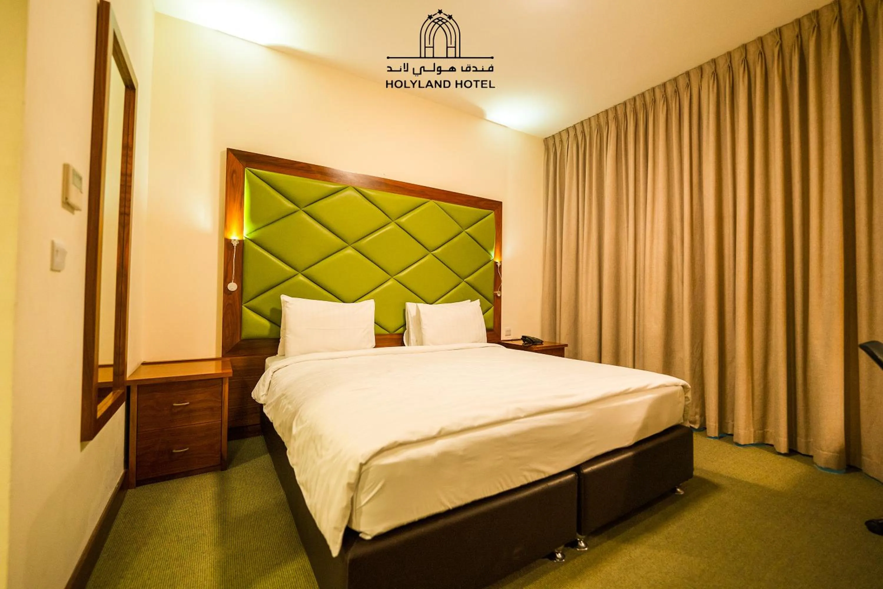 Bed in Holyland Hotel Amman