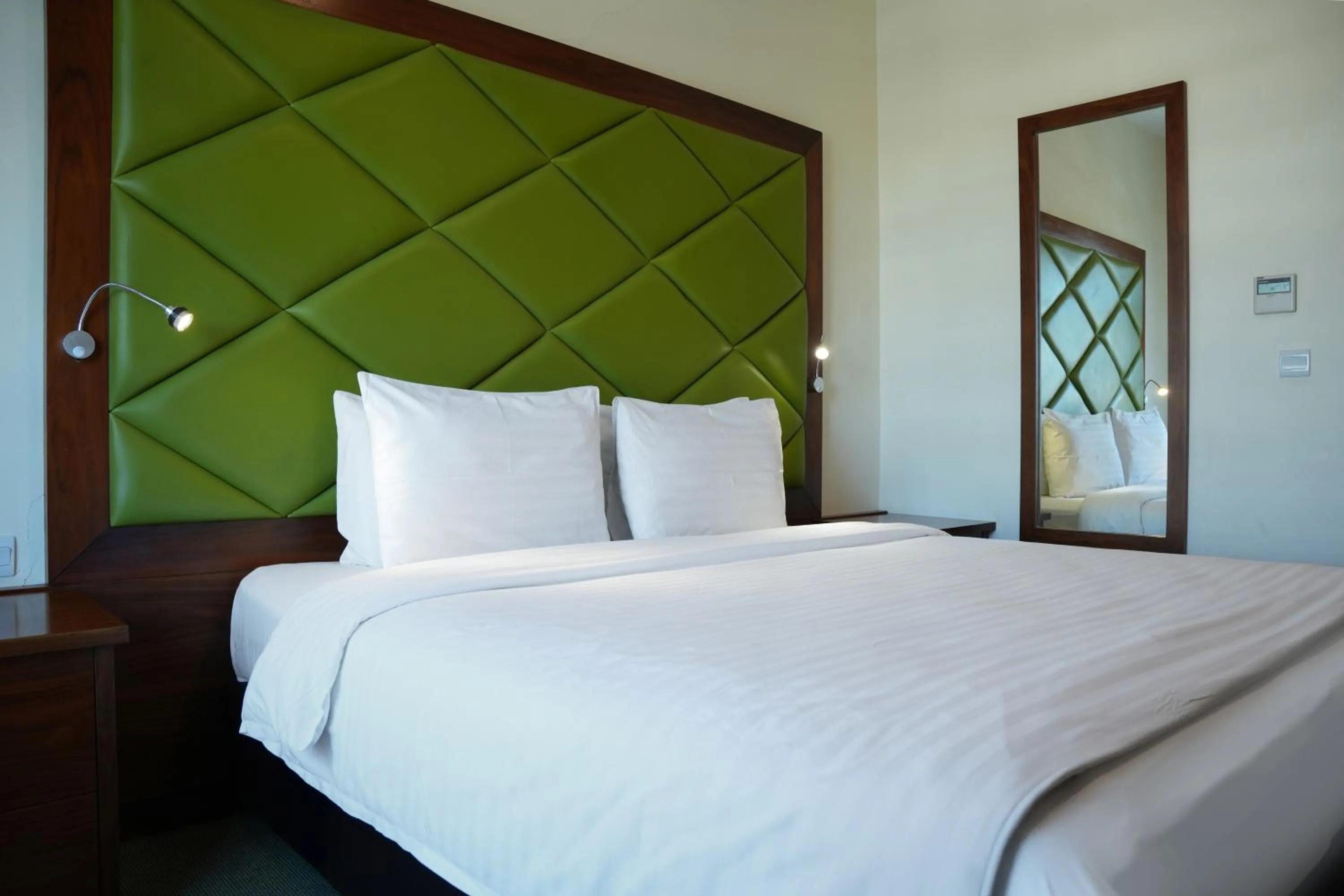 Bed in Holyland Hotel Amman