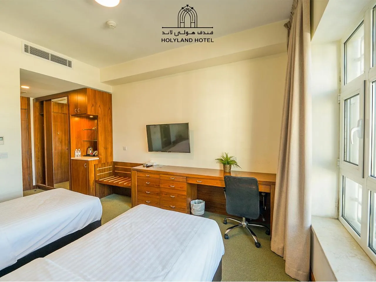 Bedroom, Bed in Holyland Hotel Amman