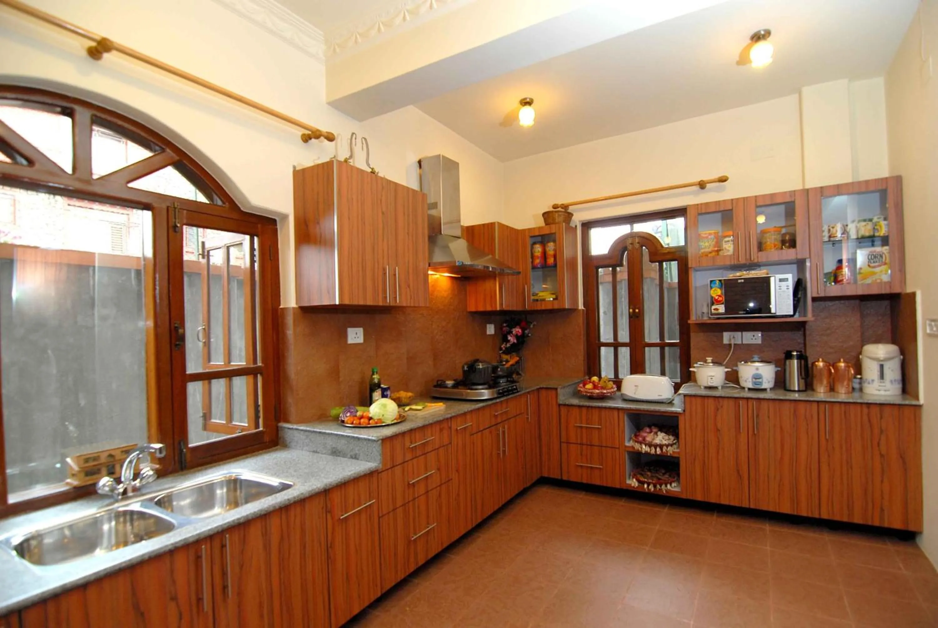 Kitchen or kitchenette in Vardan Resort n' Apartment