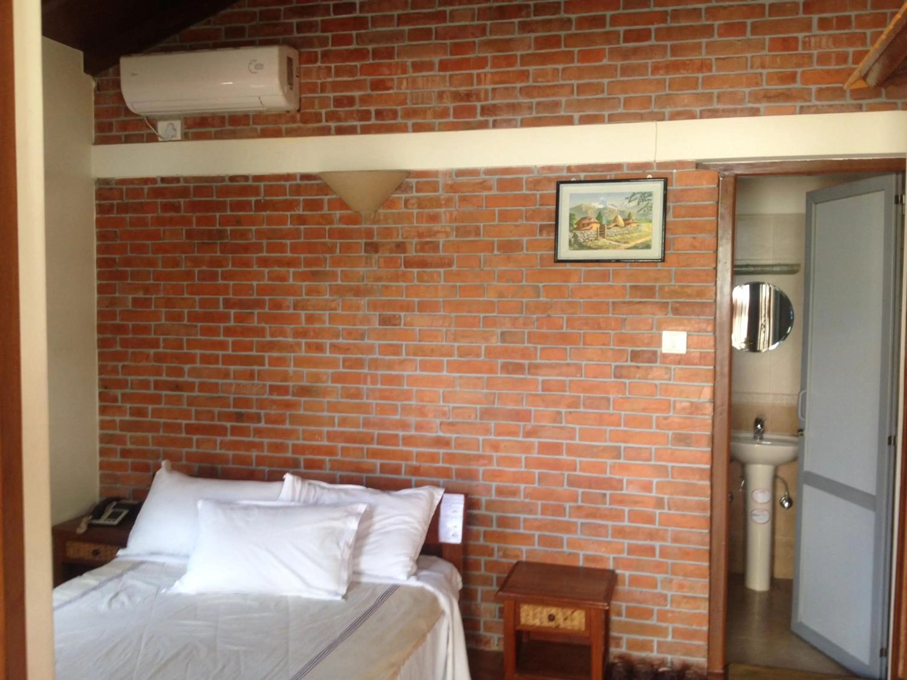 Bed in Vardan Resort n' Apartment