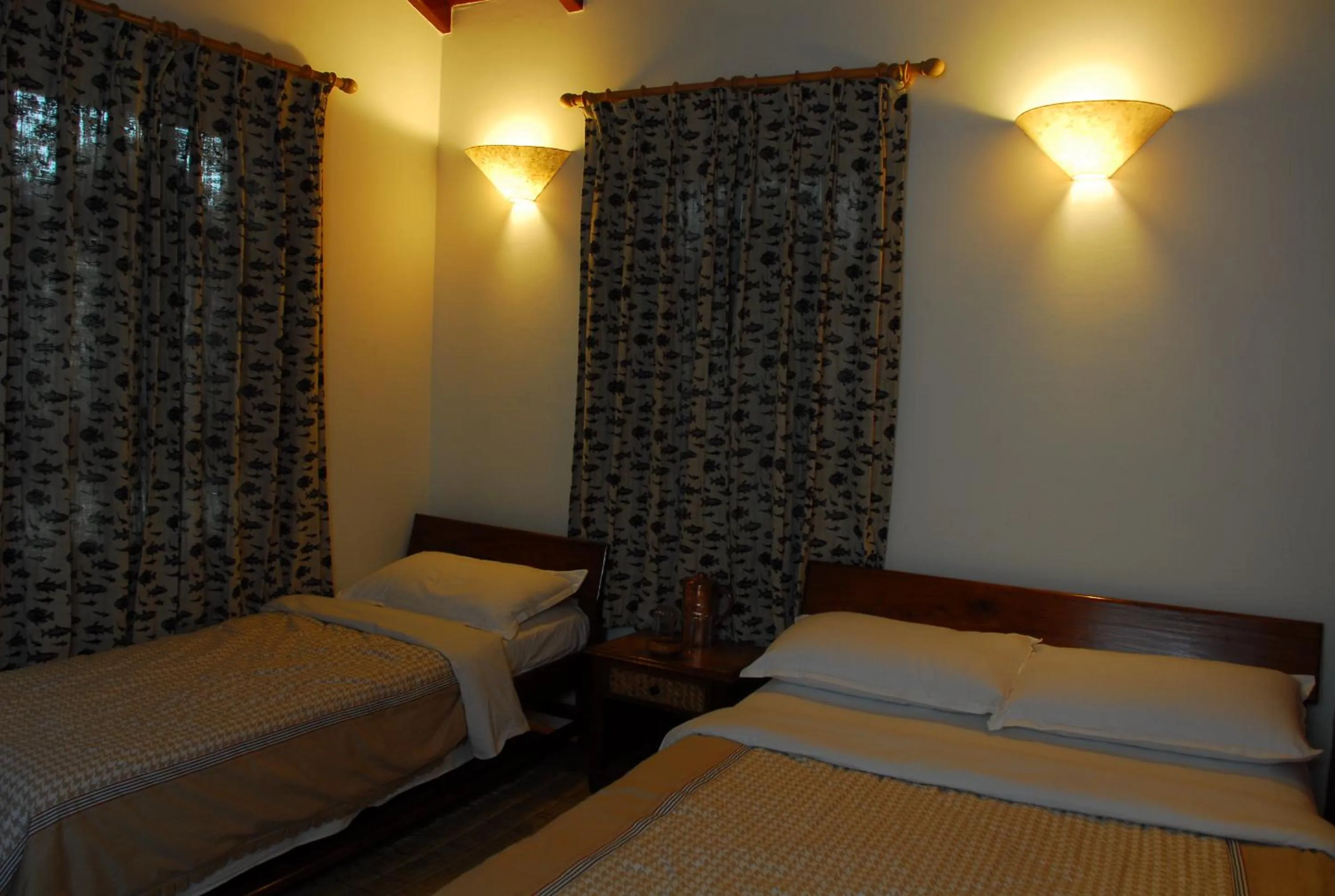 Bed in Vardan Resort n' Apartment