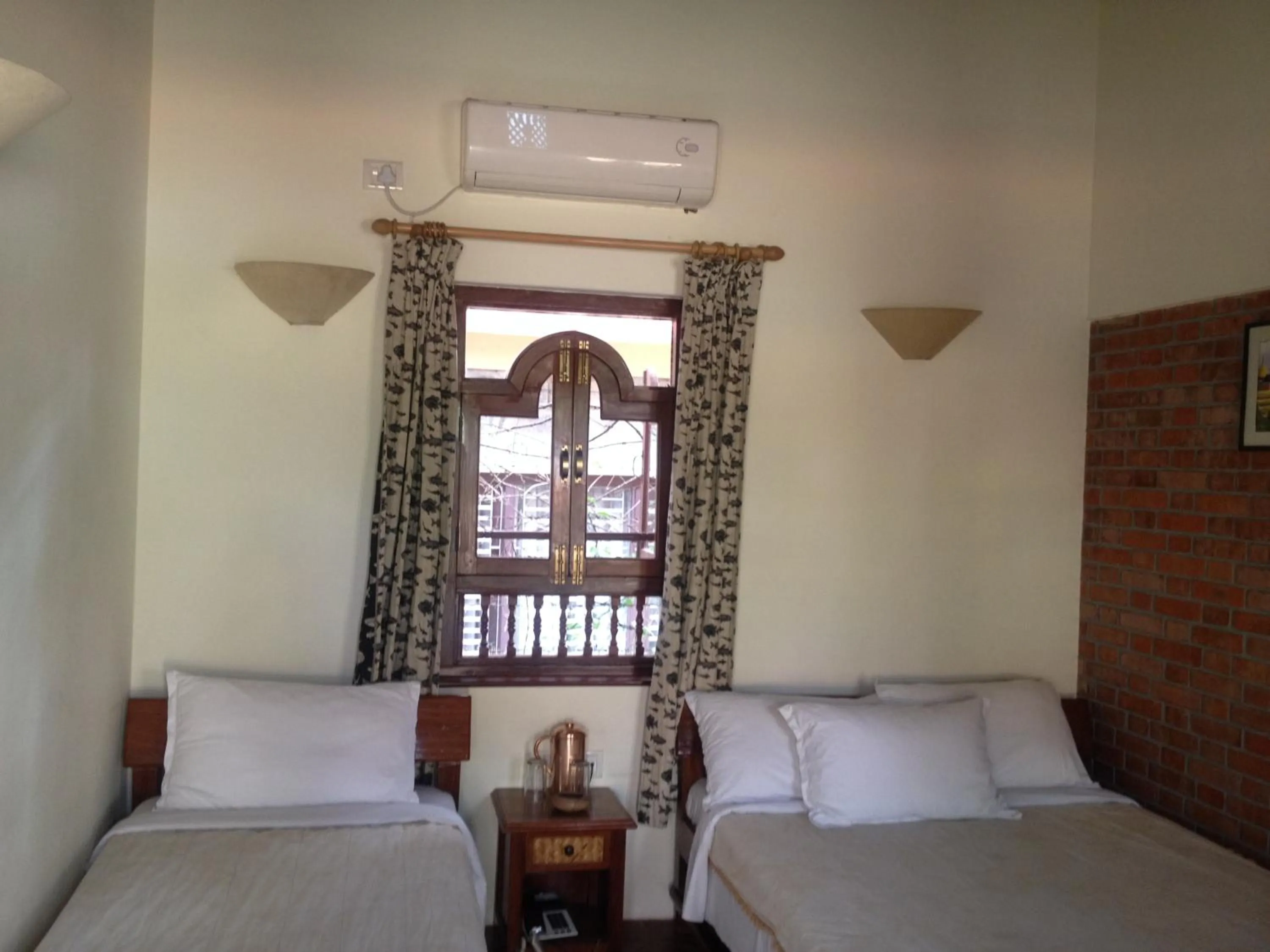 Bed in Vardan Resort n' Apartment