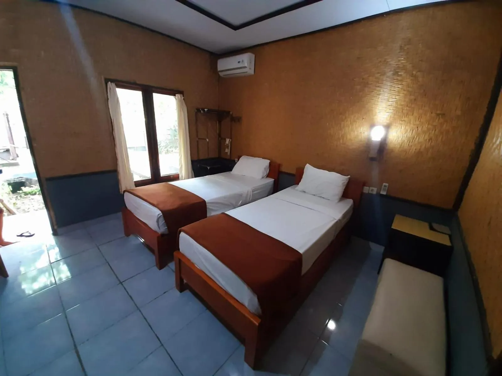 Bed in Taman Menjangan homestay by SnorkelingMenjangan