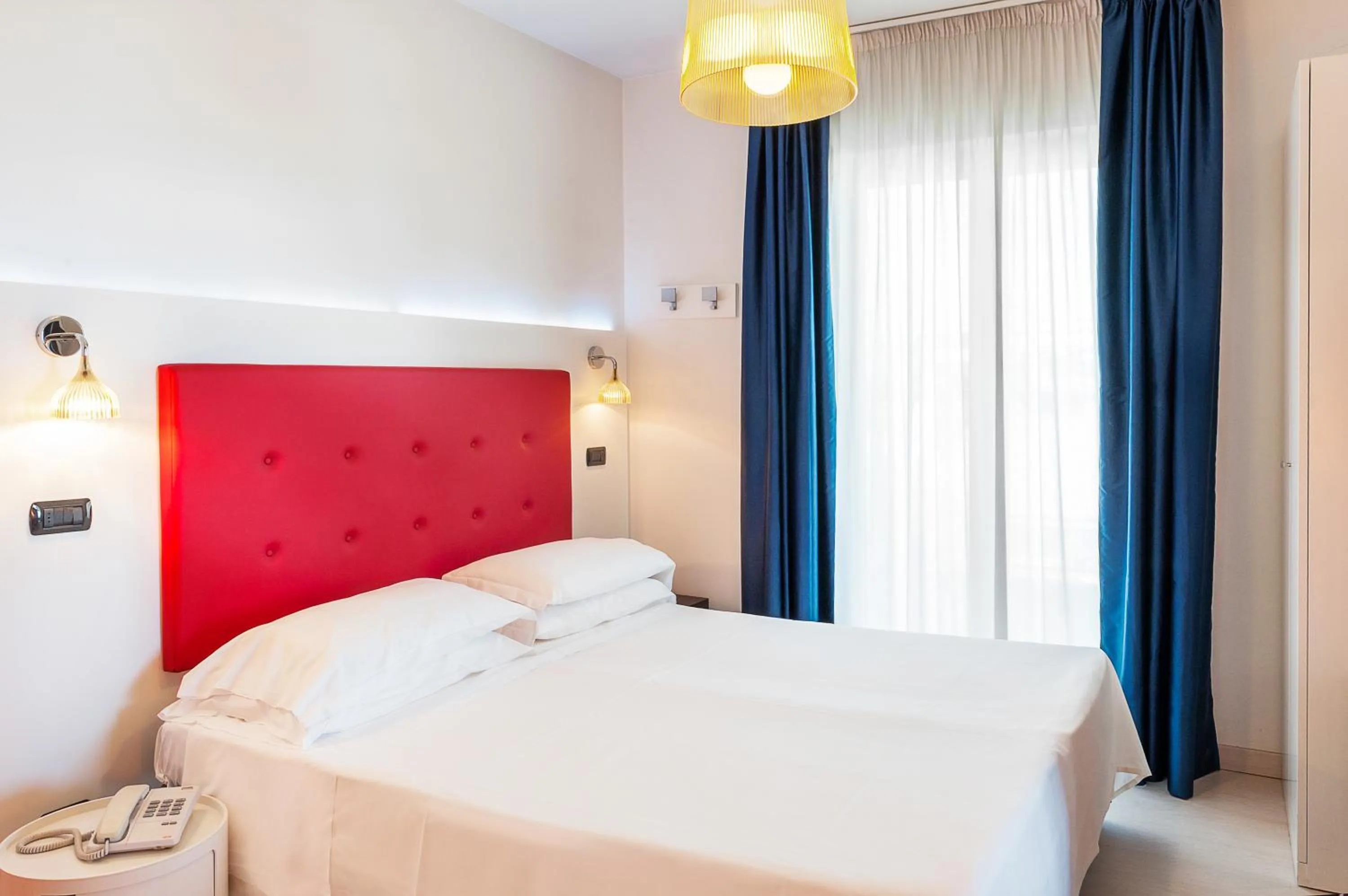 Bed in Hotel Villa Corallo