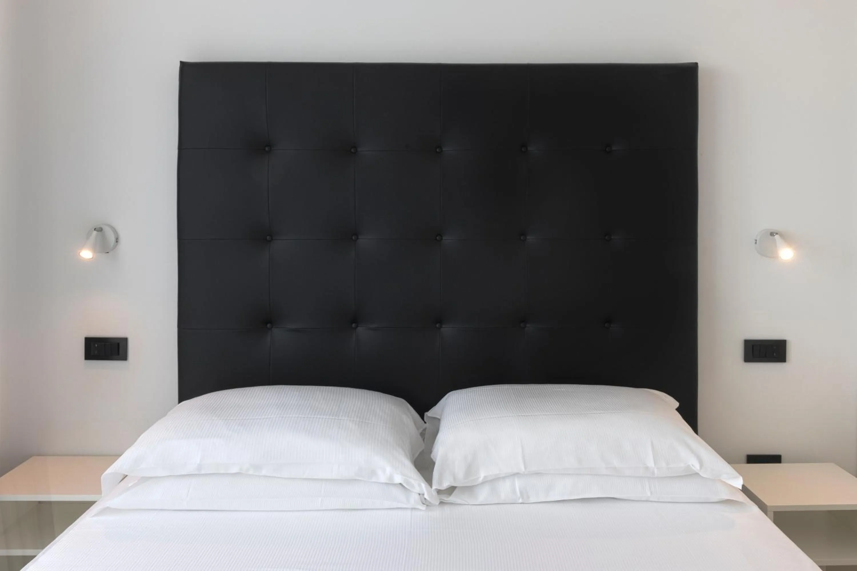 Bed in Hotel Villa Corallo