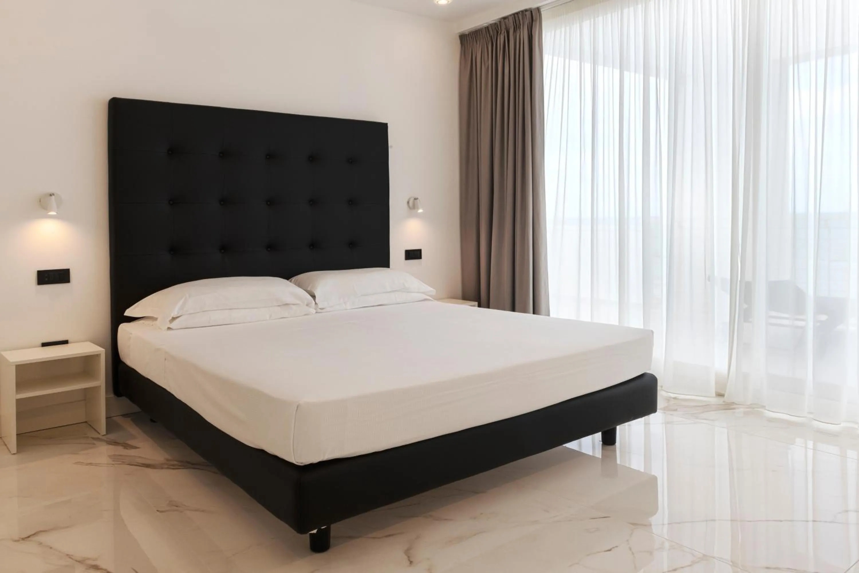 Bed in Hotel Villa Corallo