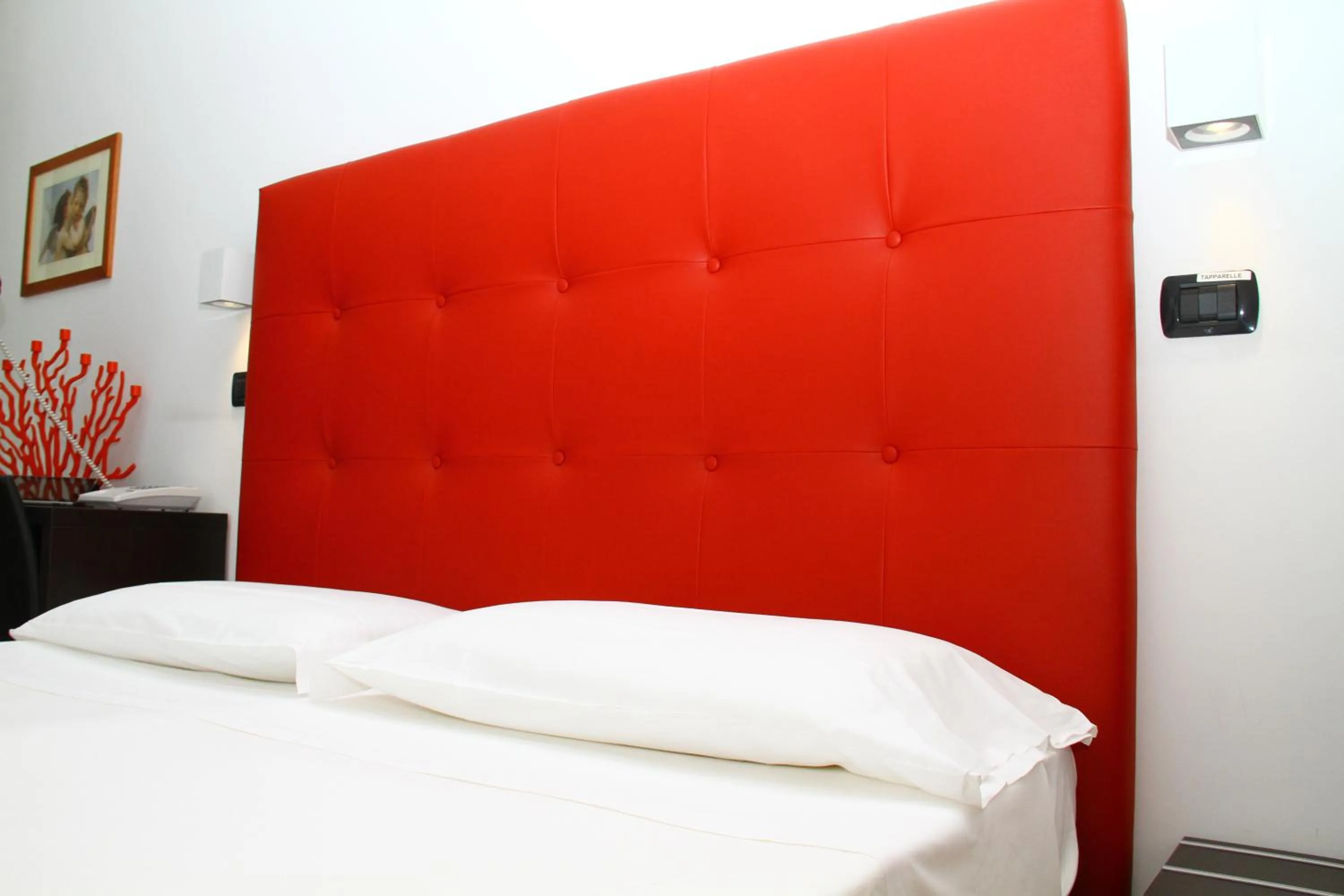 Bed in Hotel Villa Corallo