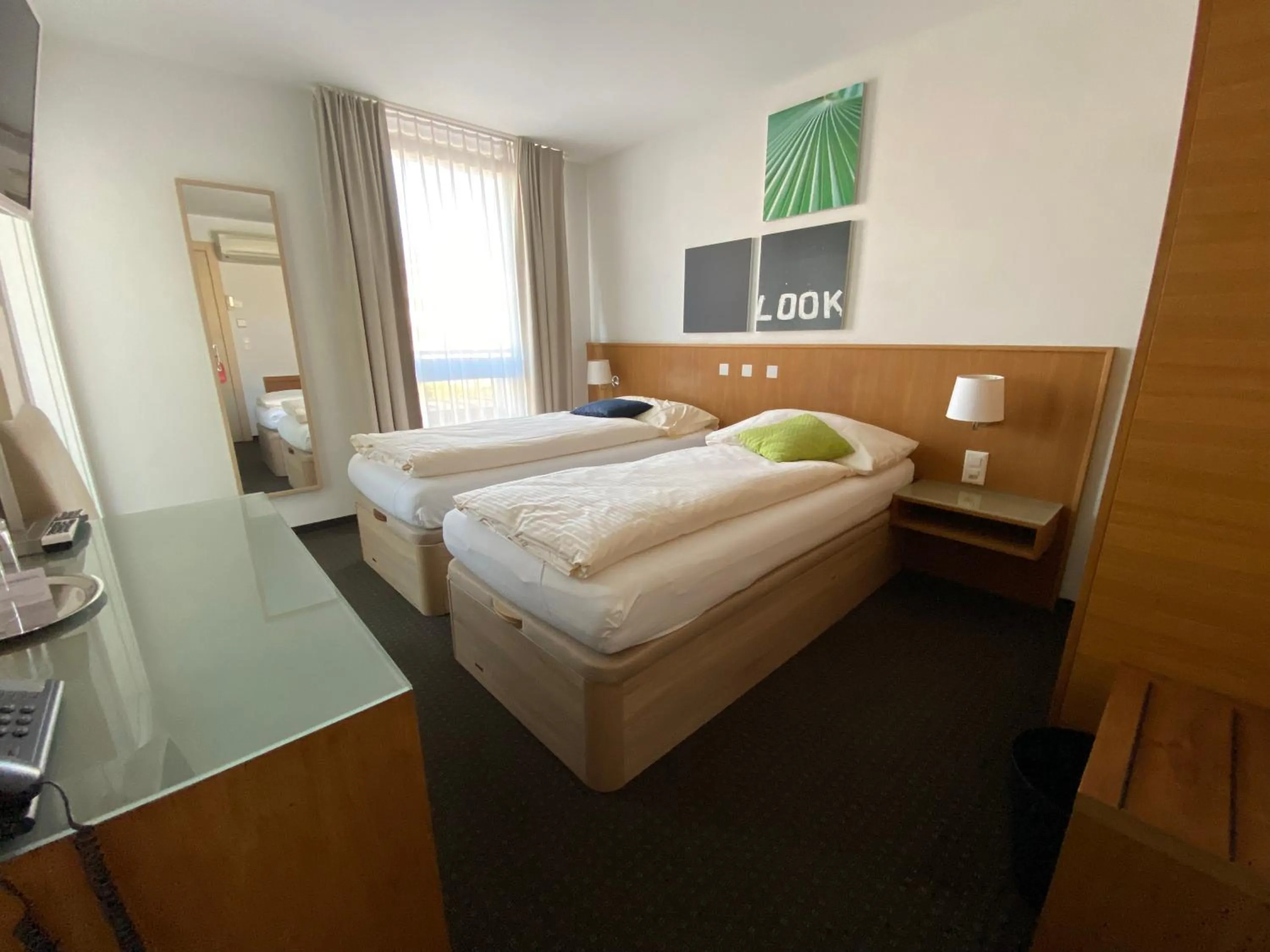 Photo of the whole room, Bed in Businesshotel Lux