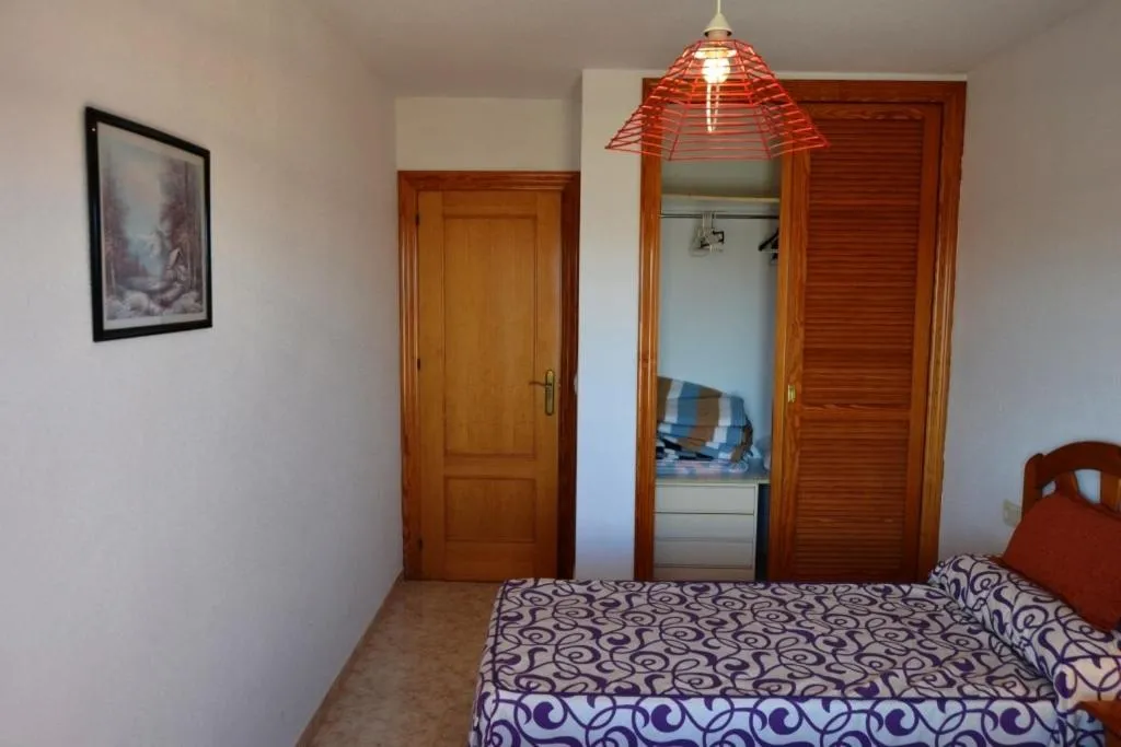 Photo of the whole room, Bed in Apartamentos Turísticos Hawaii 6